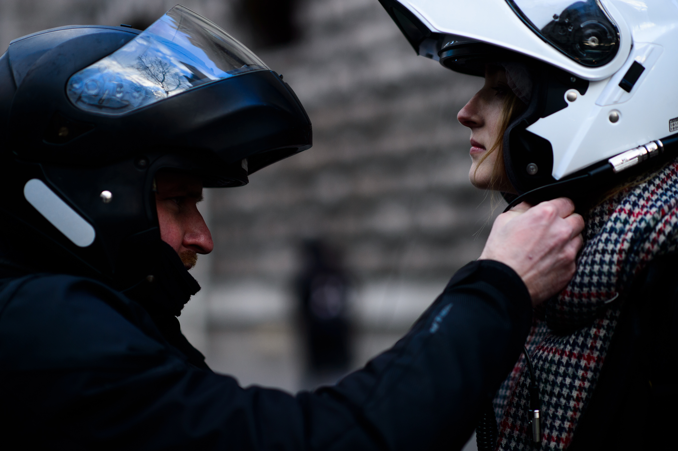 Model having motorcycle helmet fitted