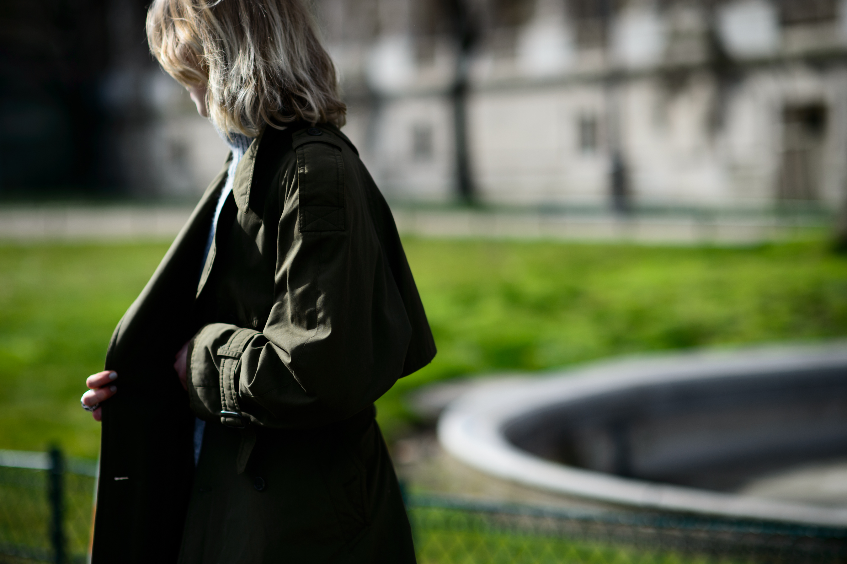 Polish model wearing khaki coat
