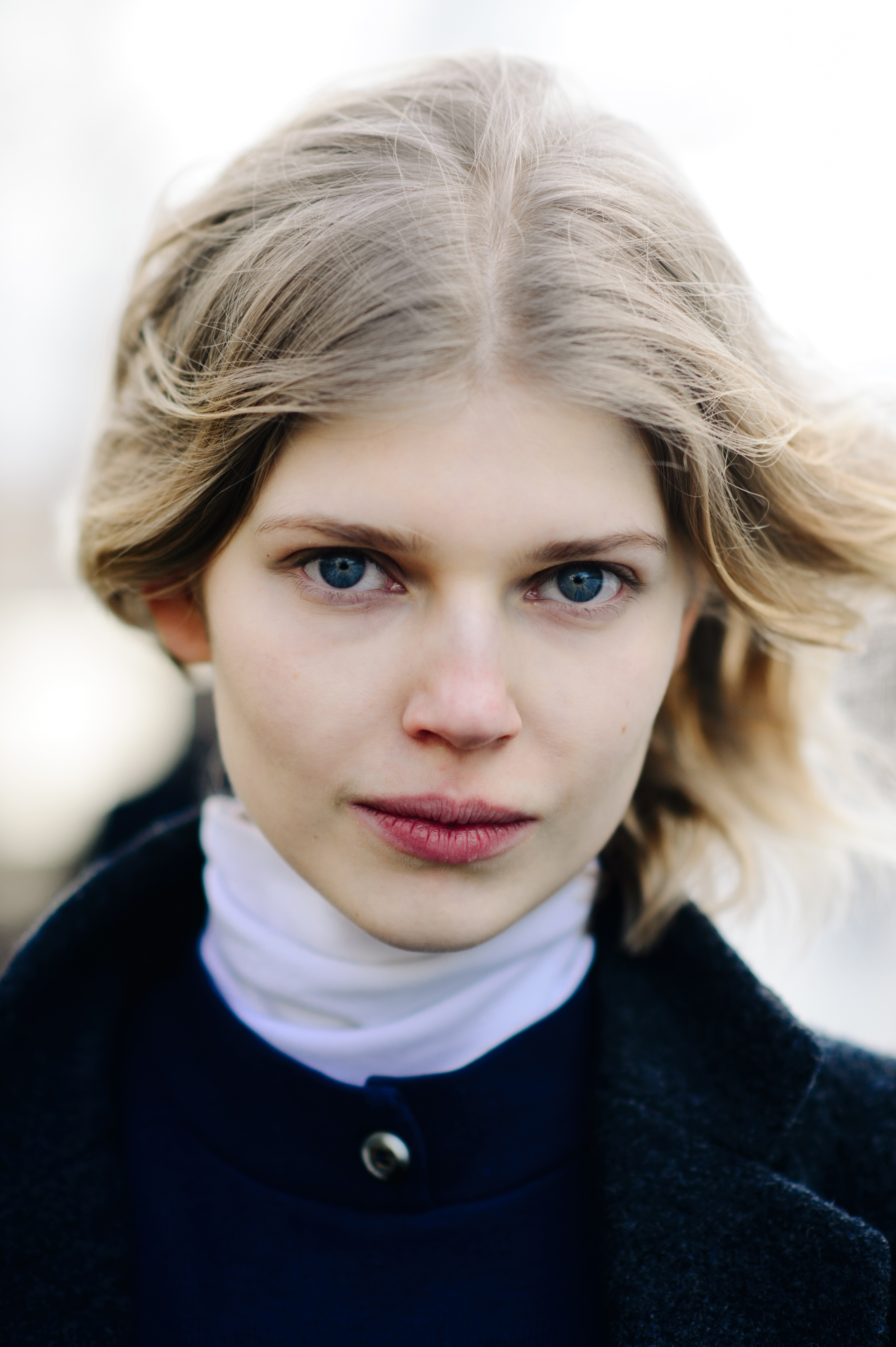 Portrait of model with blonde hair and blue eyes