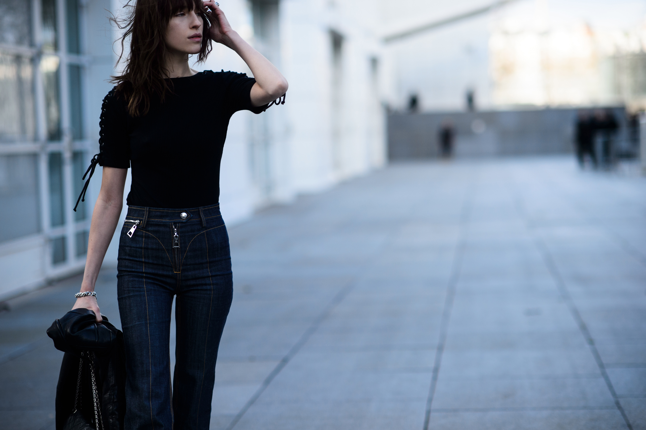 Model walking with windswept hair
