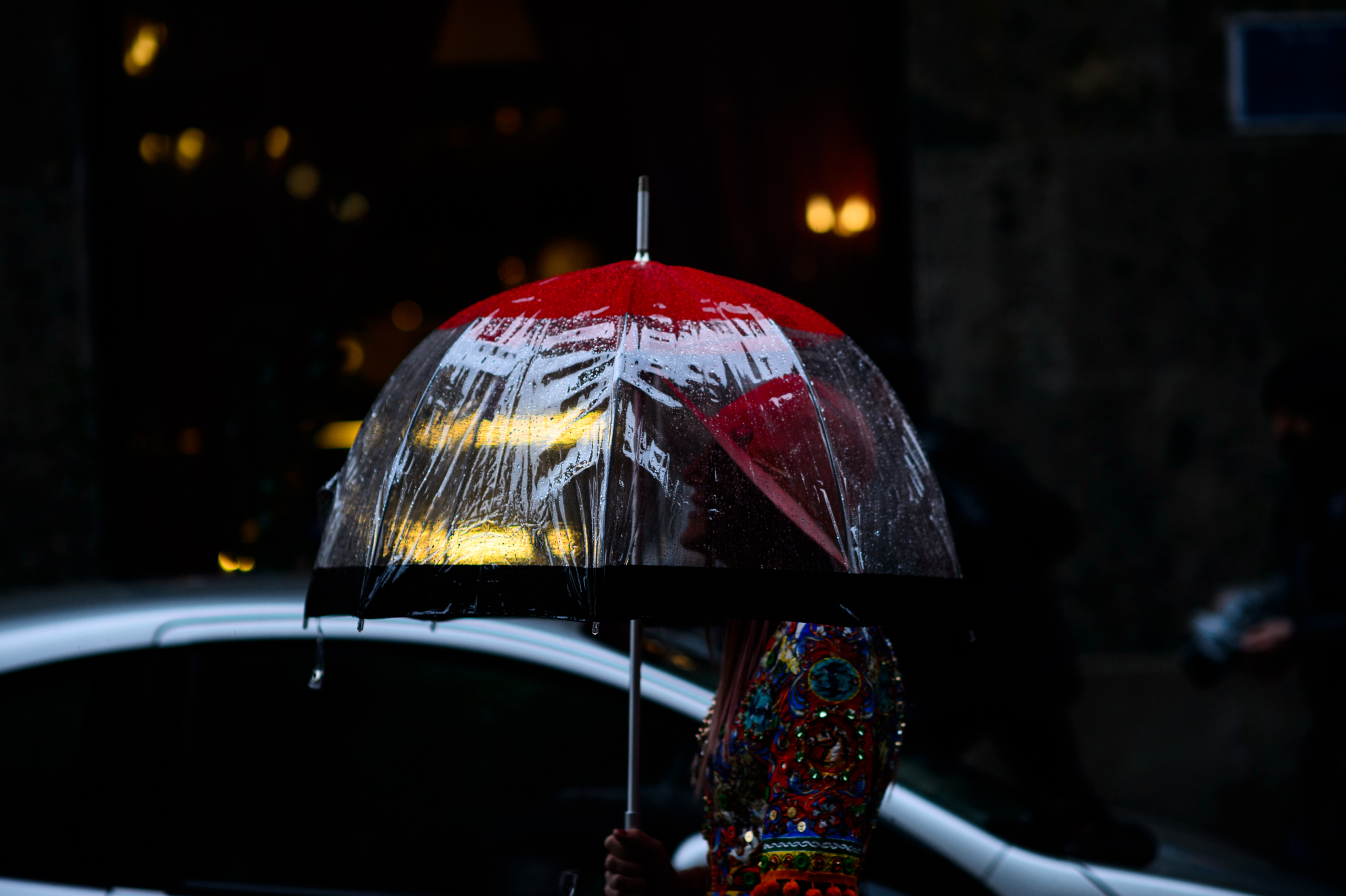 Italian woman under transparent umbrella