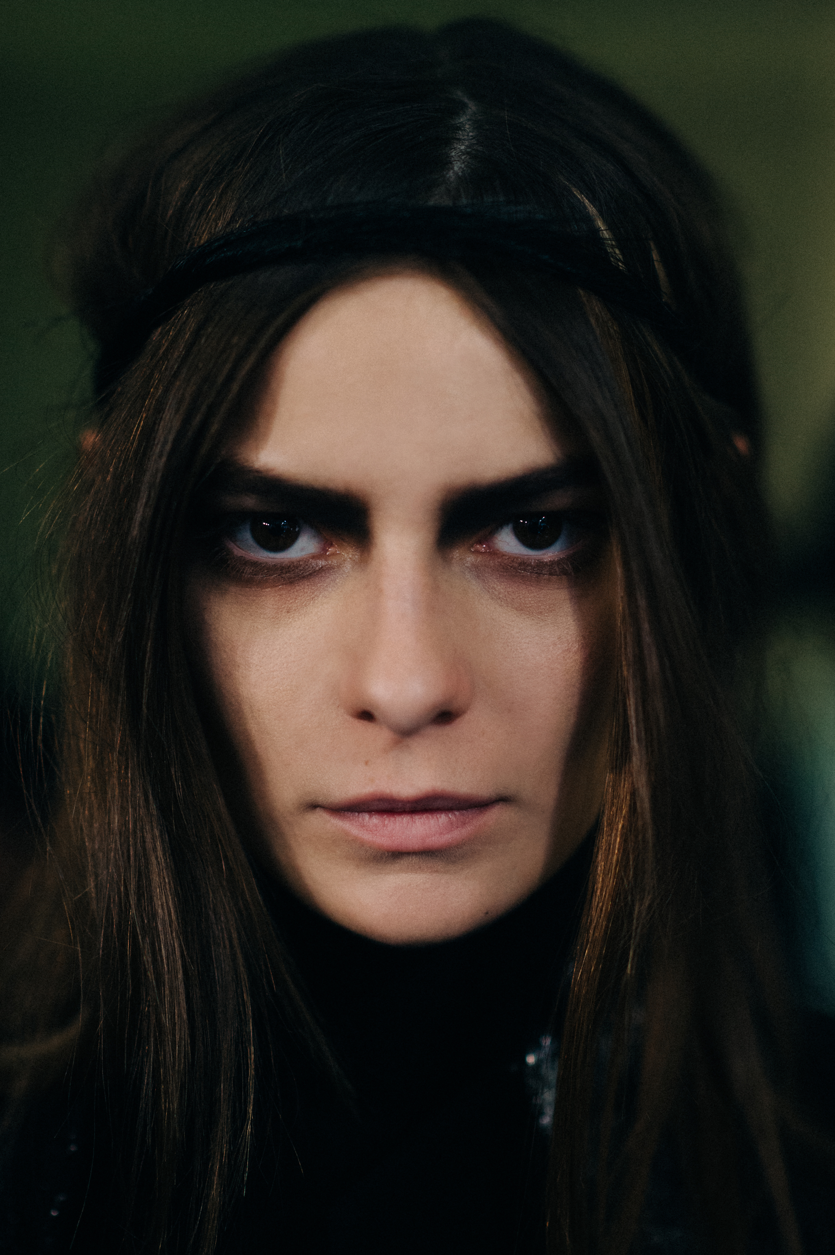 Portrait of model with intense stare and headband