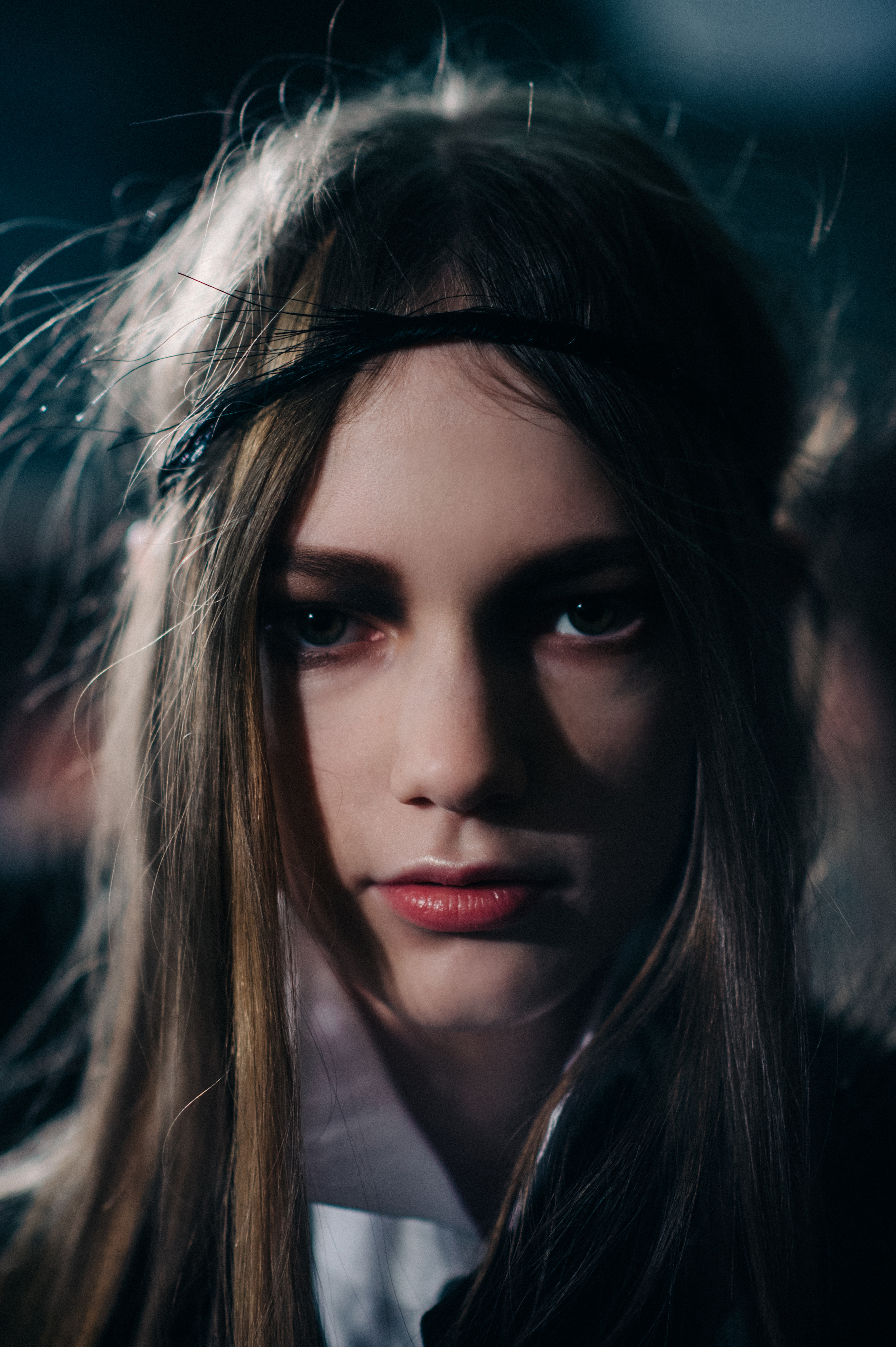 Portrait of model with blonde hair and pink lips