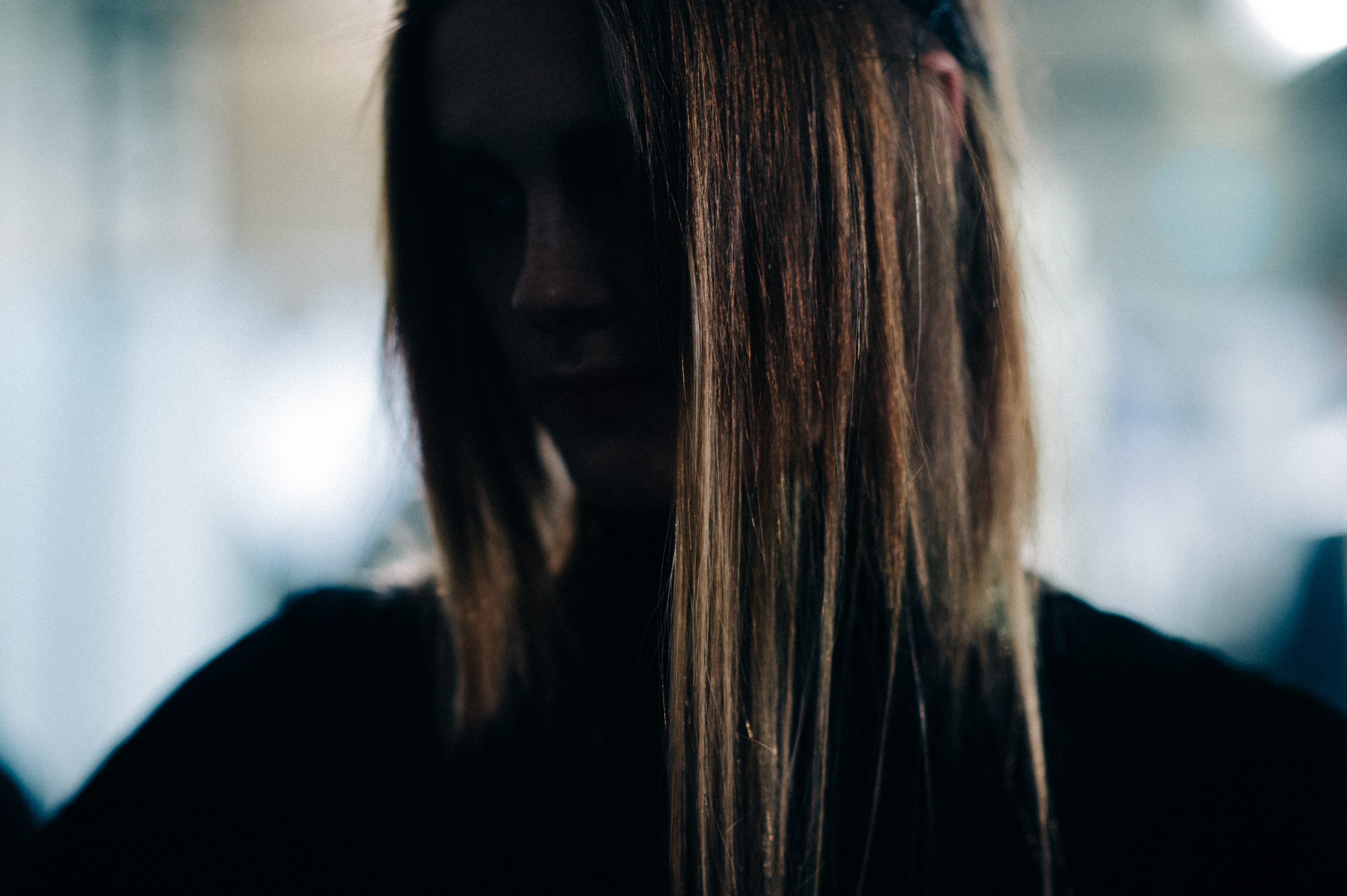 Closeup of model with hair catching light