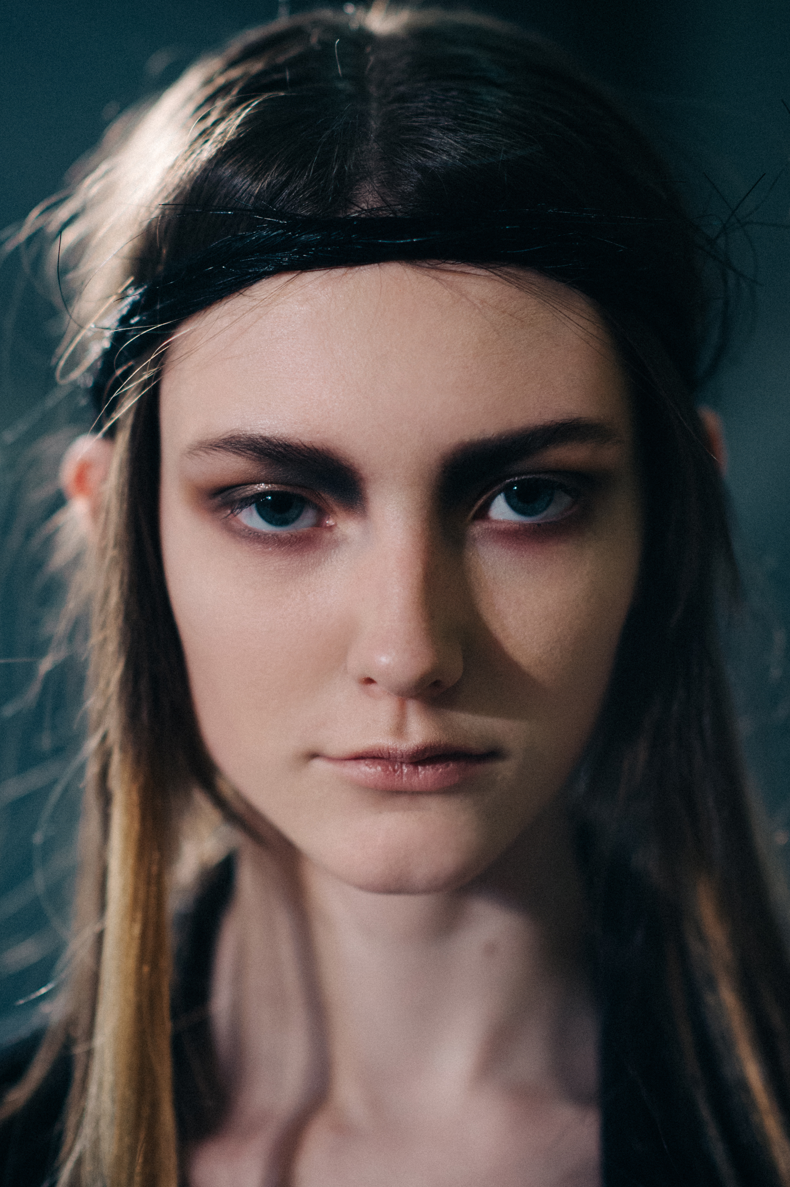 Portrait of American model with dark eye makeup
