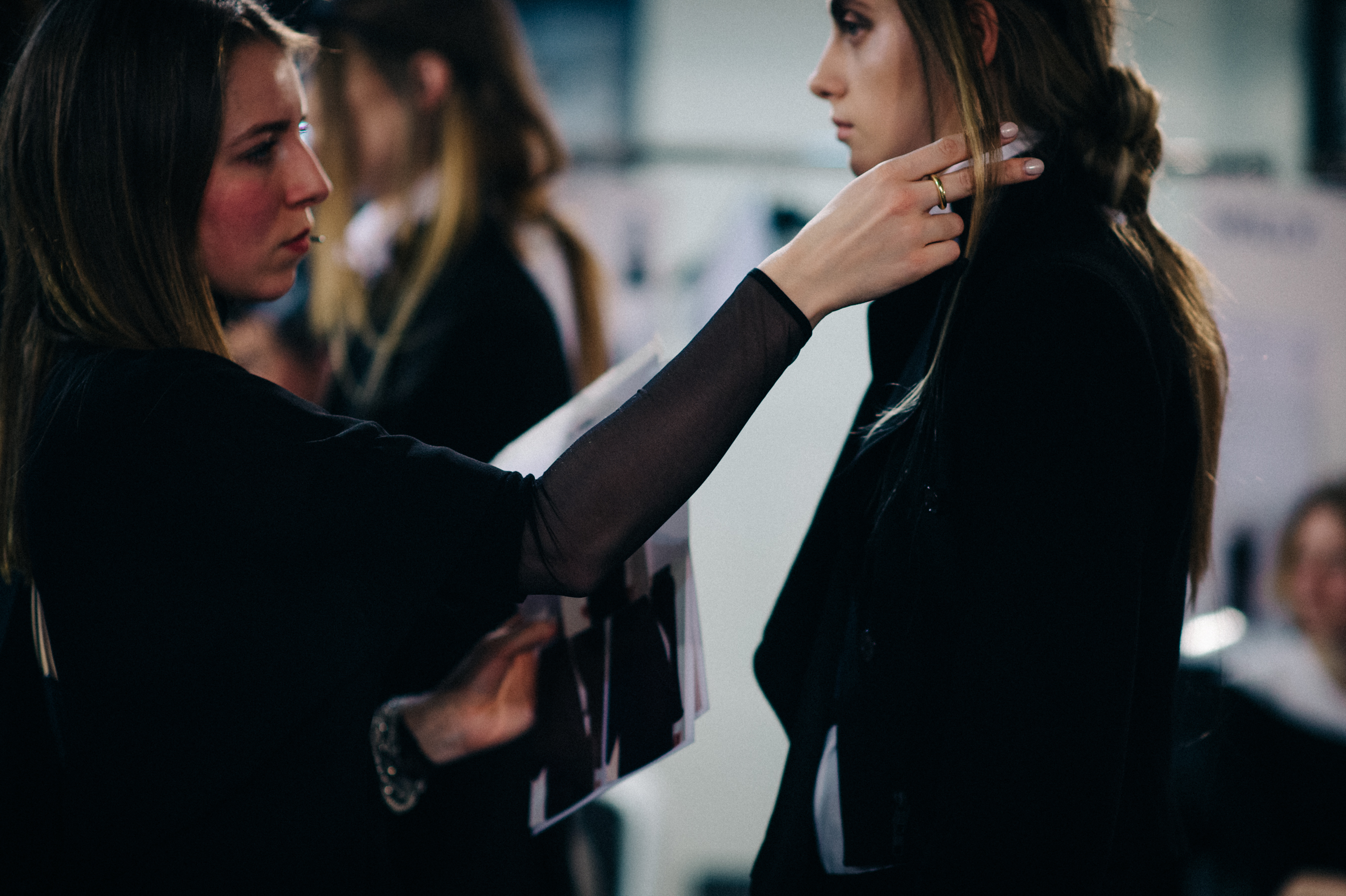 Russian model has her outfit checked backstage