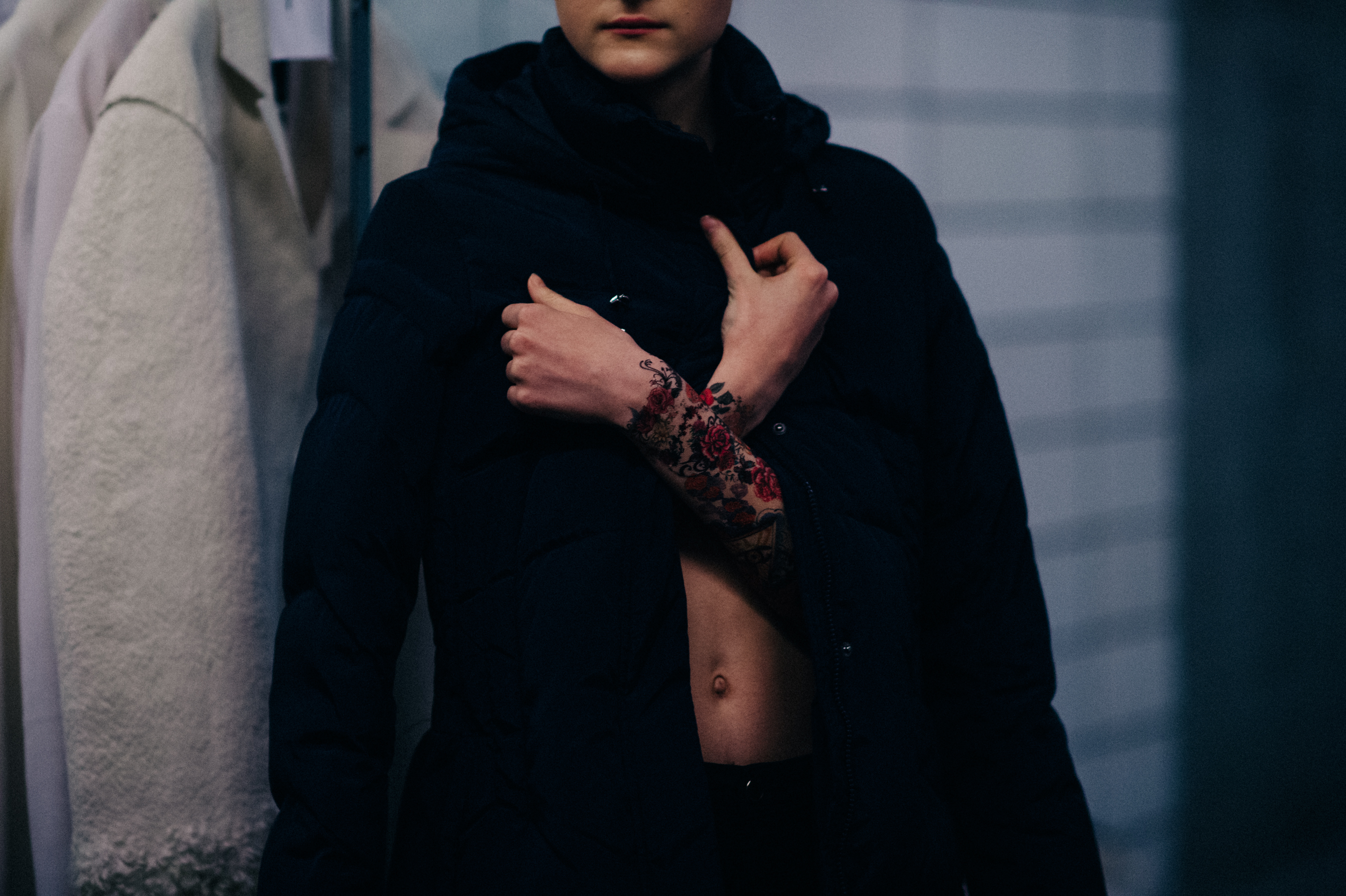 Model wearing black outfit