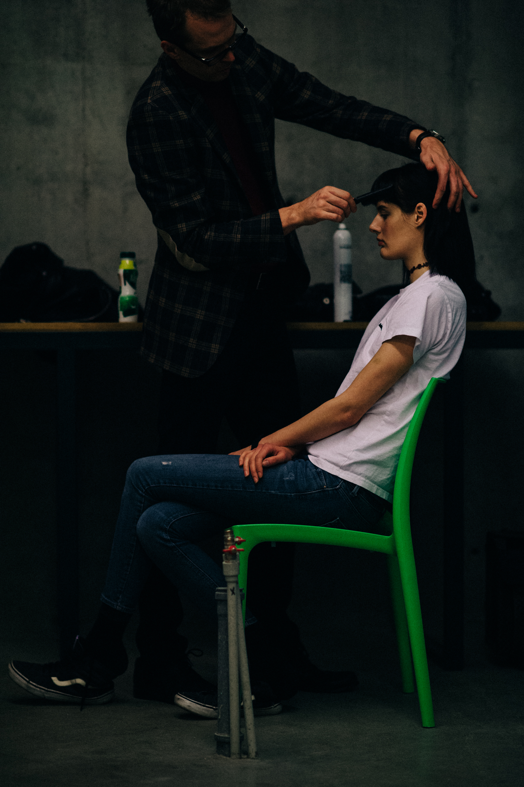 Model getting hair done before show