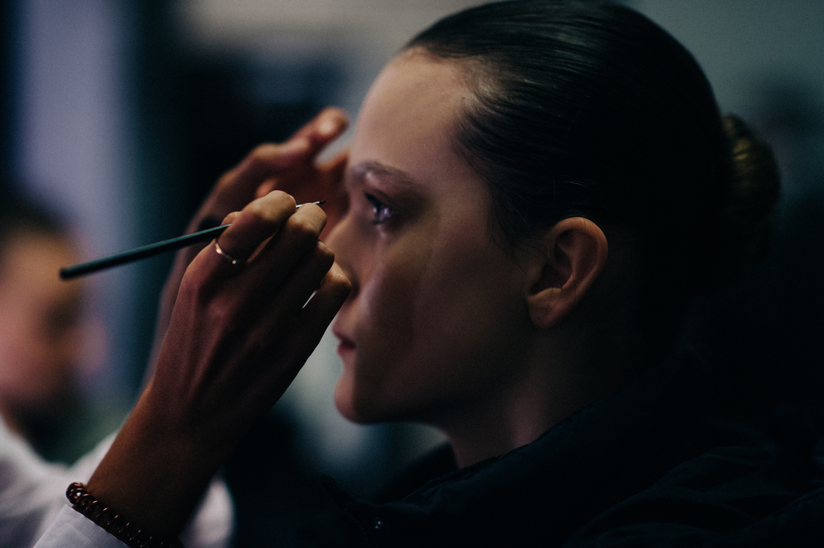 Model getting make up done