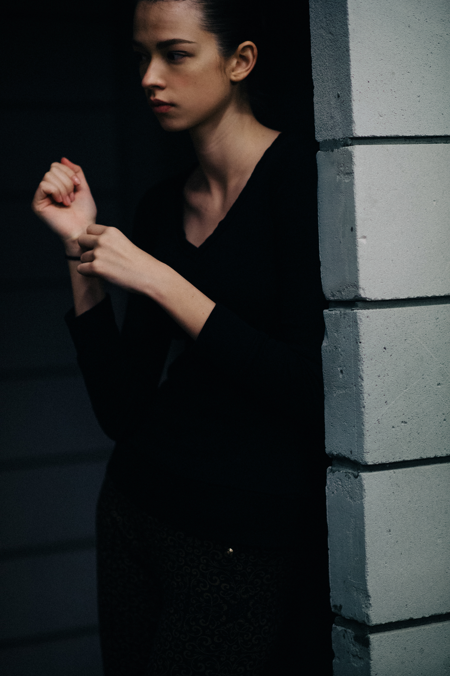 Model wearing black outfit
