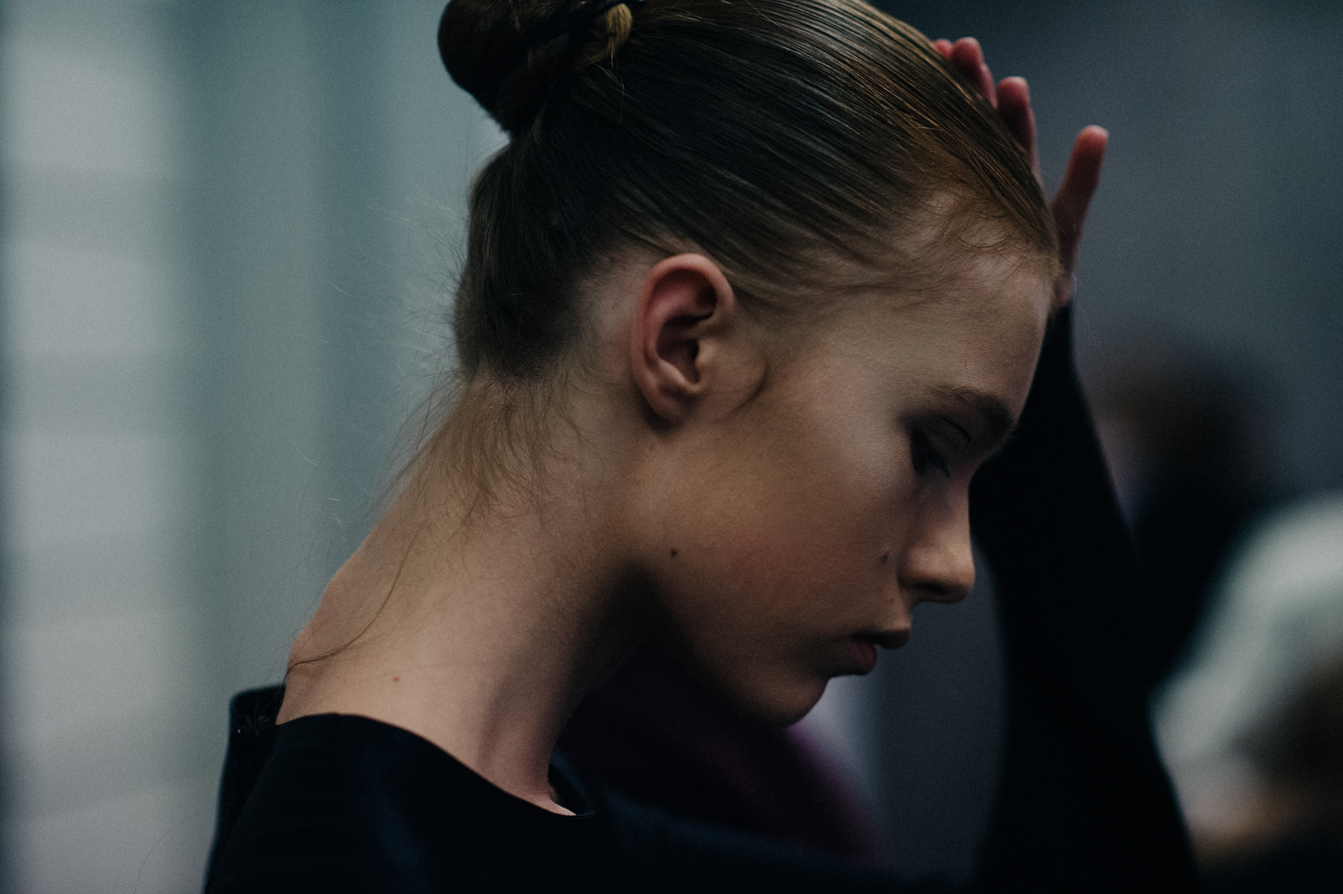 Model getting hair done before show