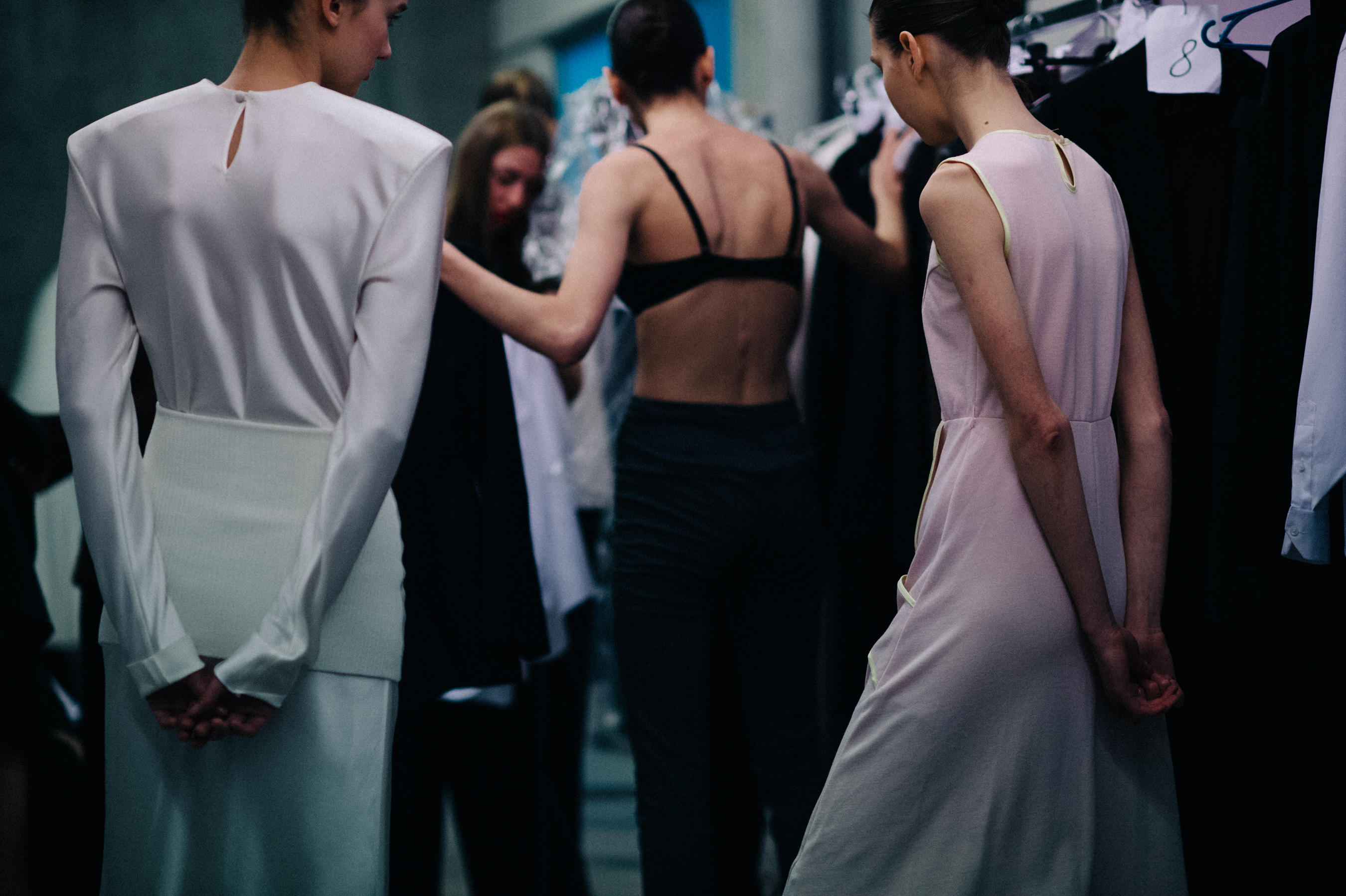 Models getting dressed before the show