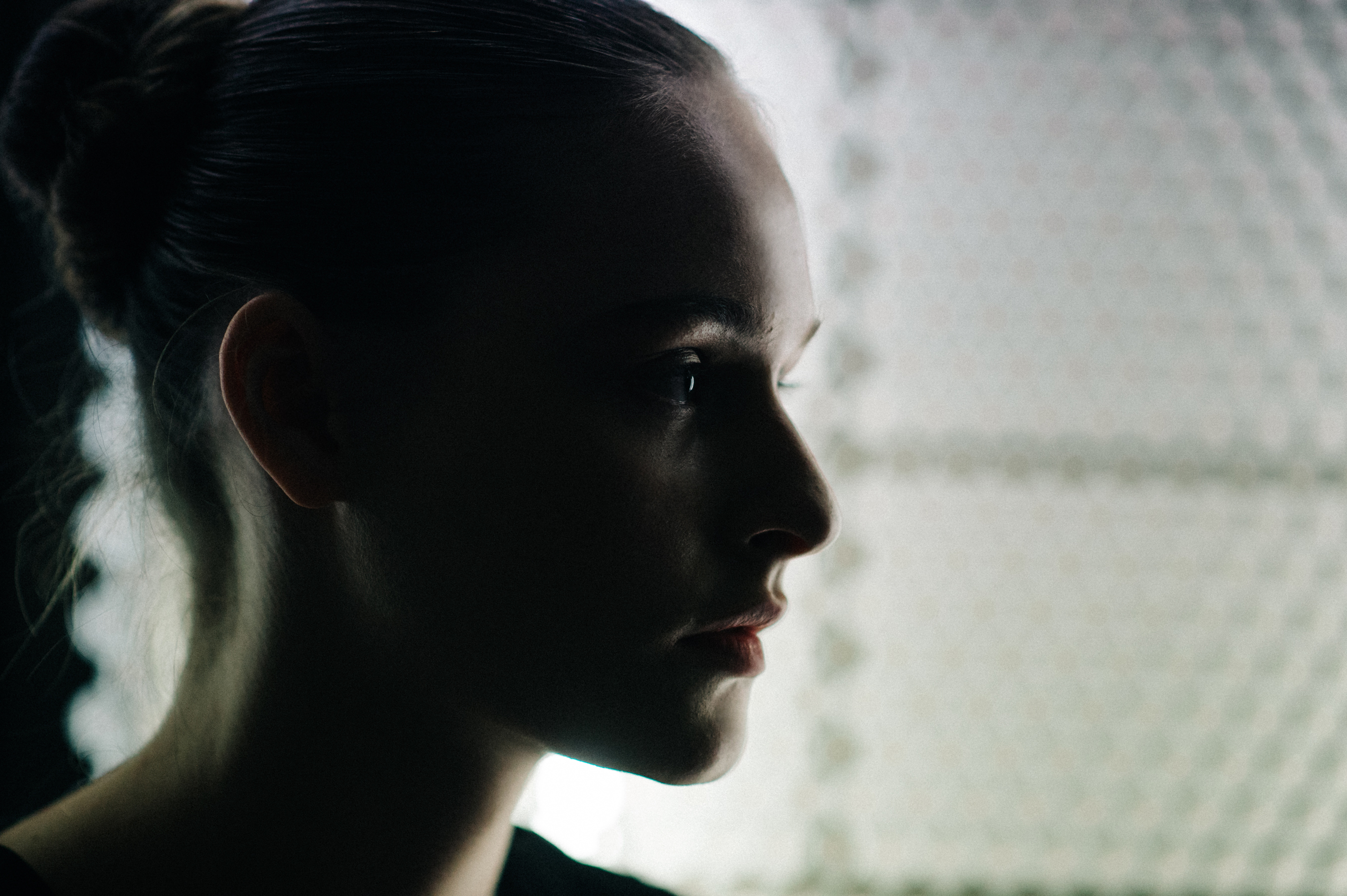Side portrait of a model before show