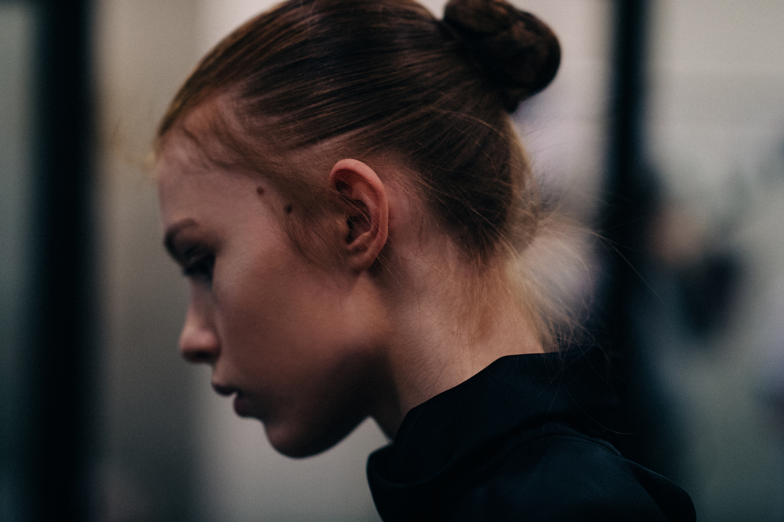 Side portrait of model tied hair