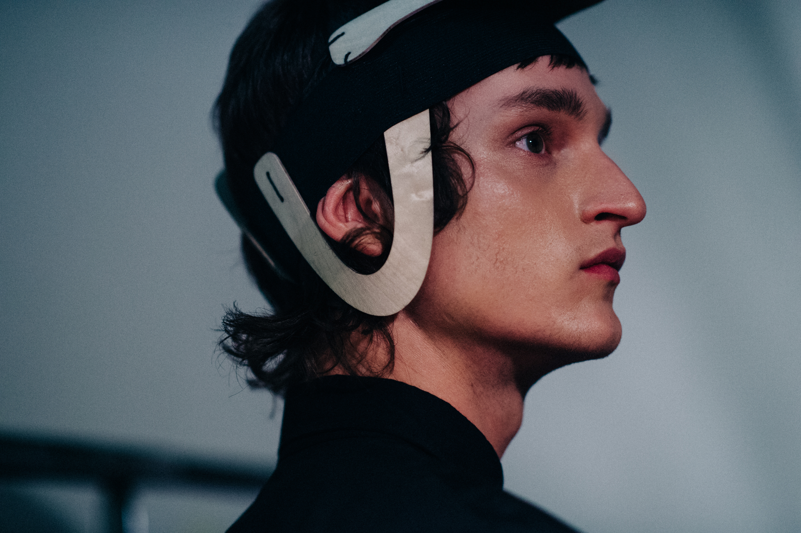 Male model wearing head piece