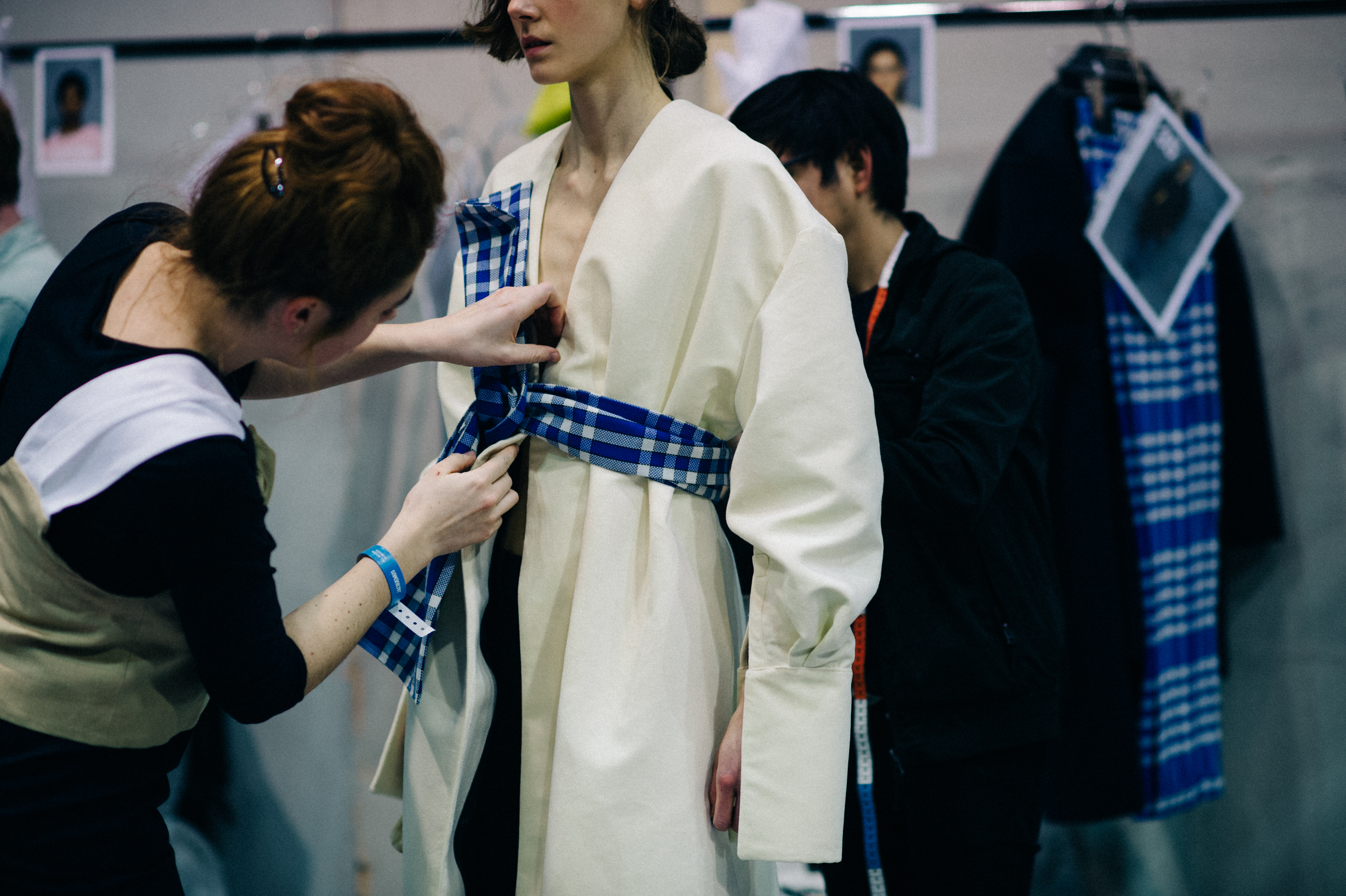 Model having bow tied around waist