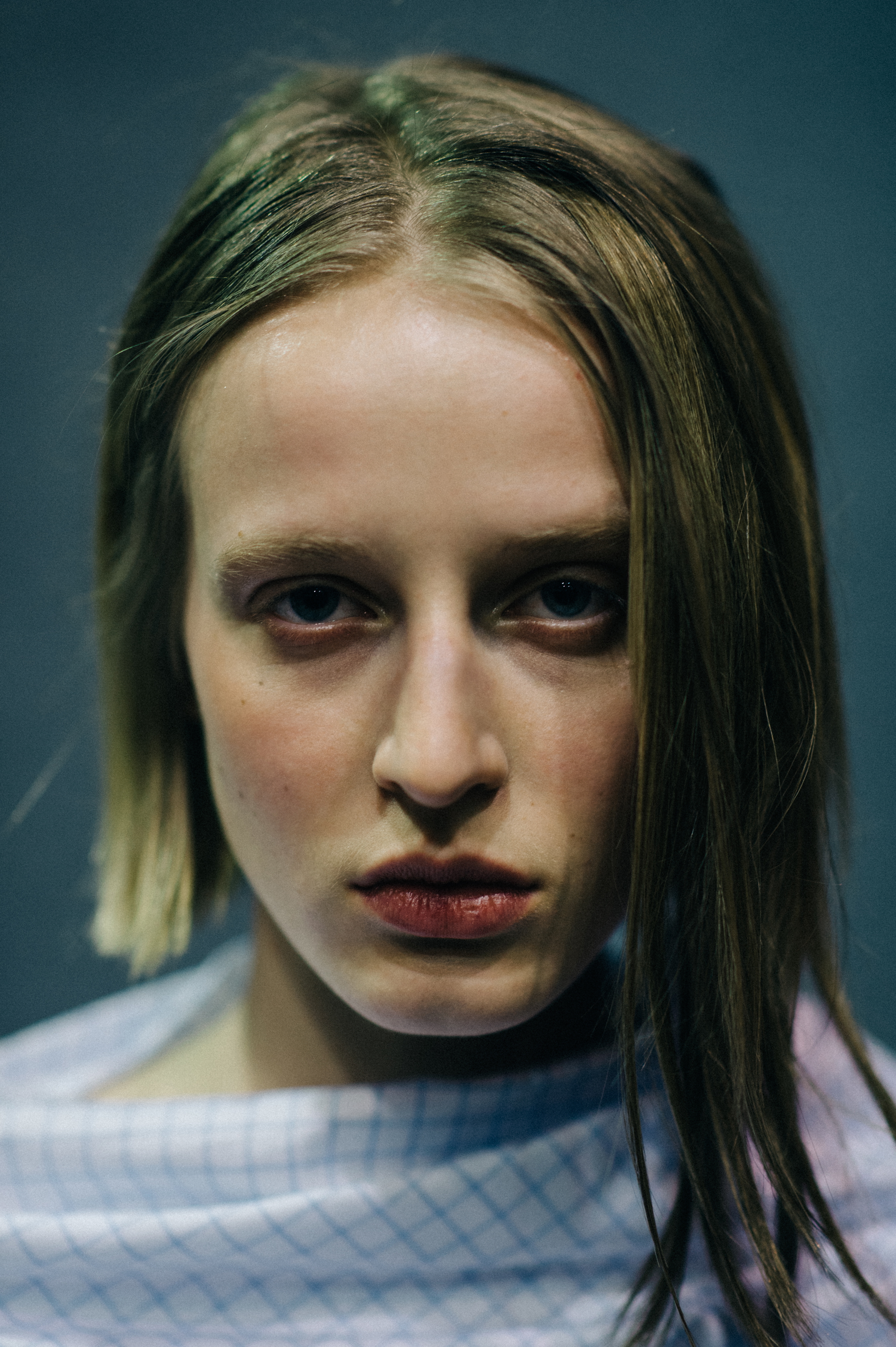 Portrait of model with blonde hair backstage