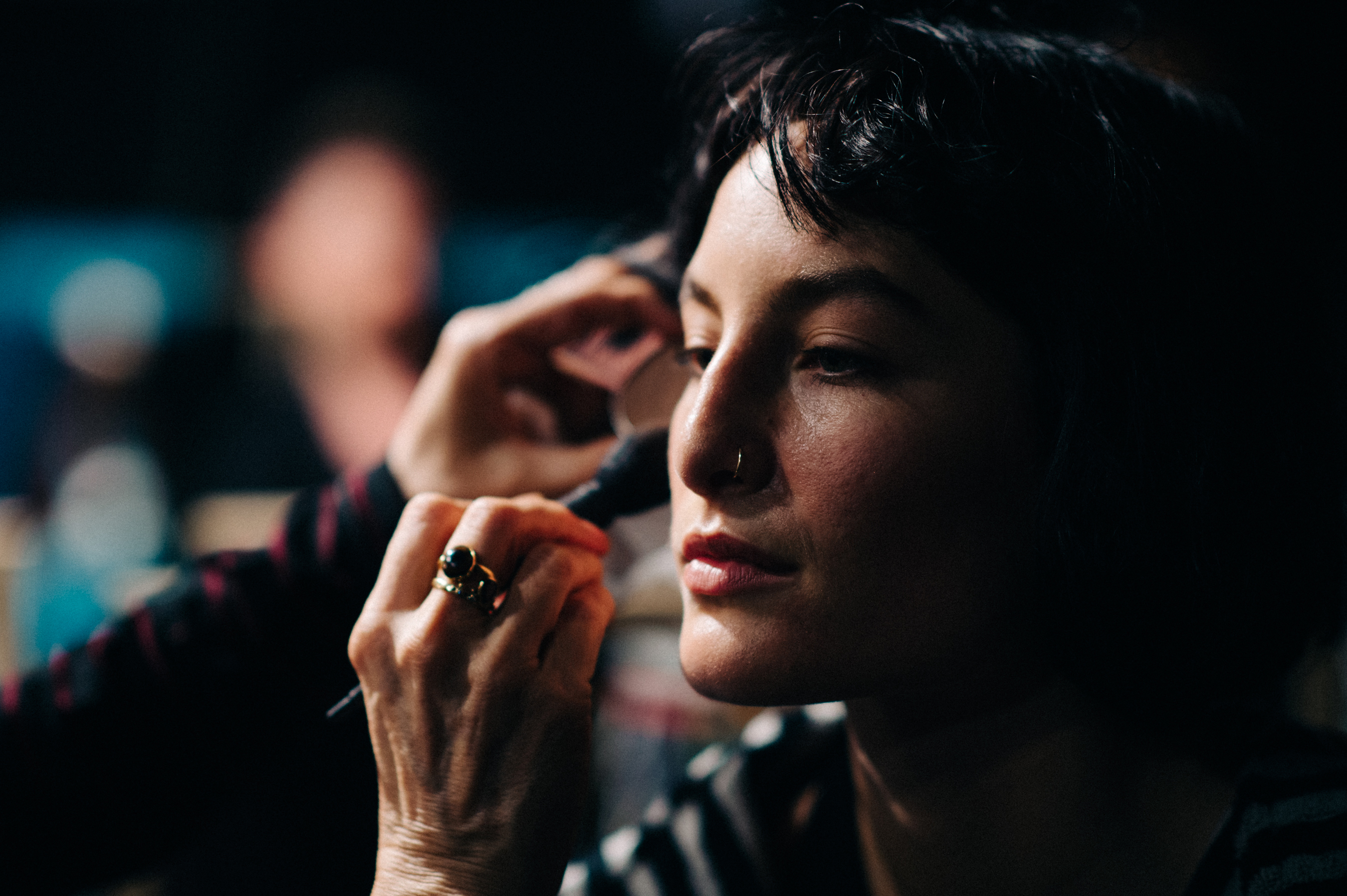 Model getting make up done