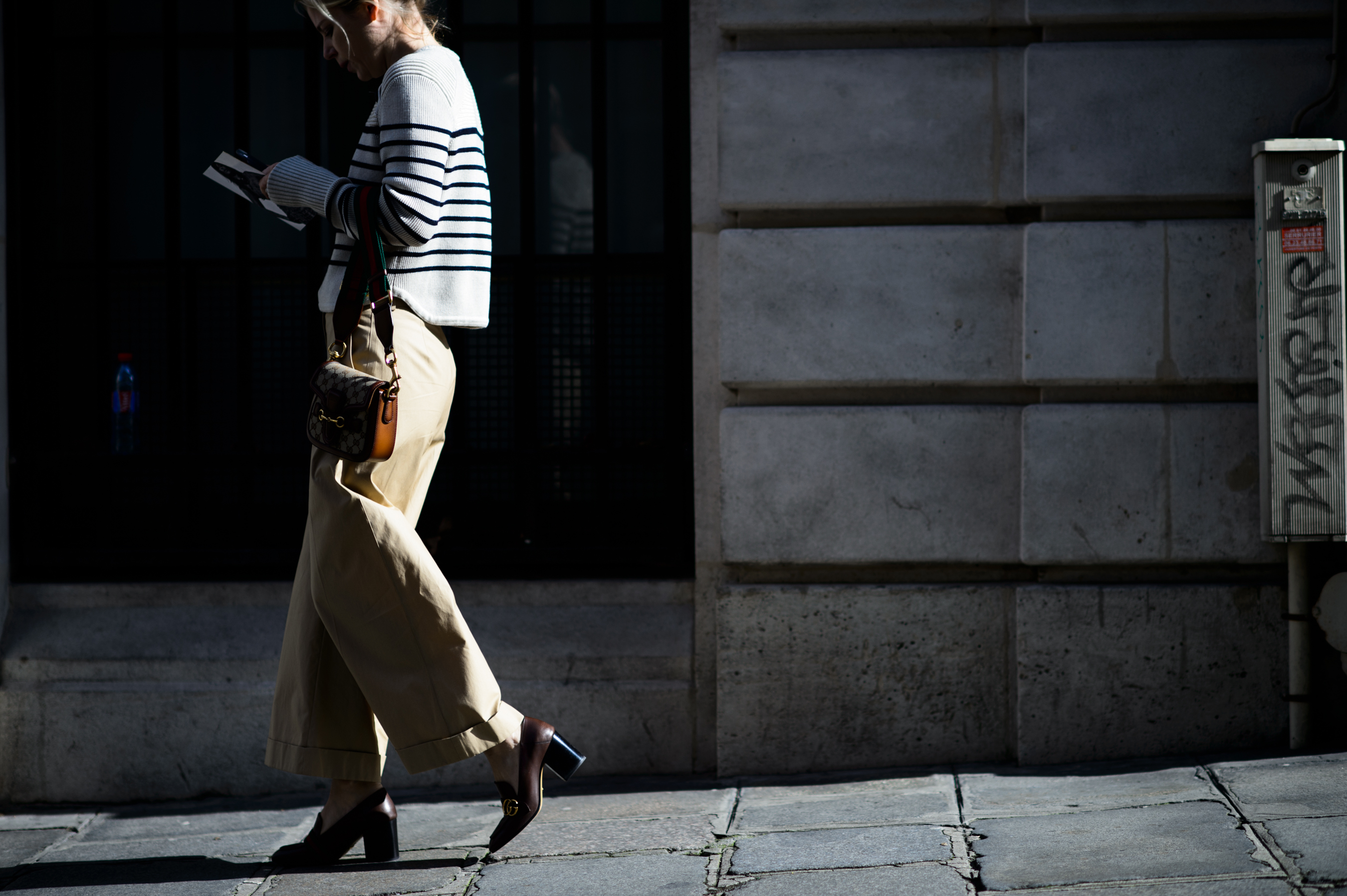 Woman walking with striped top