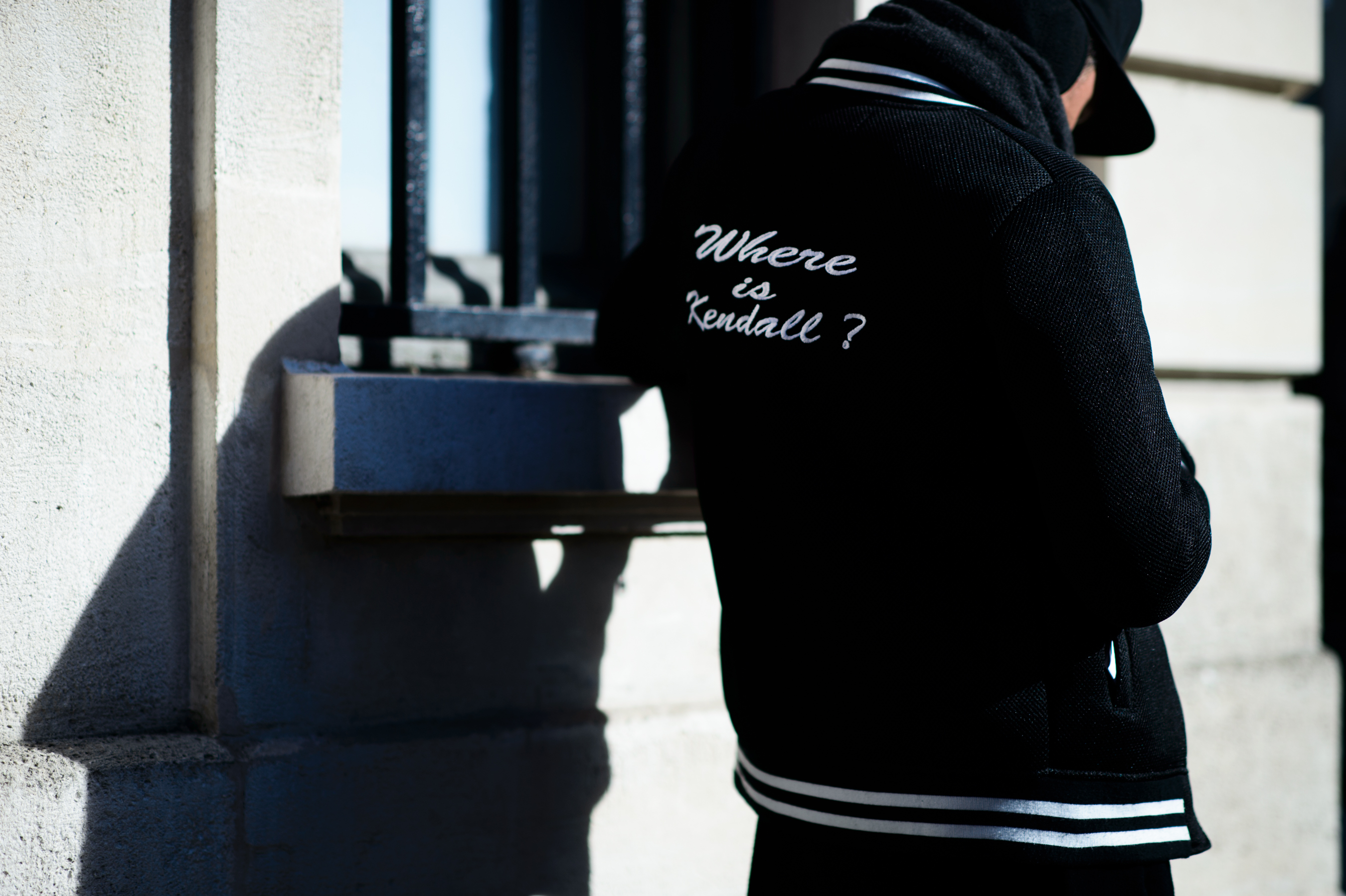 Man wearing jacket with embroidered detail