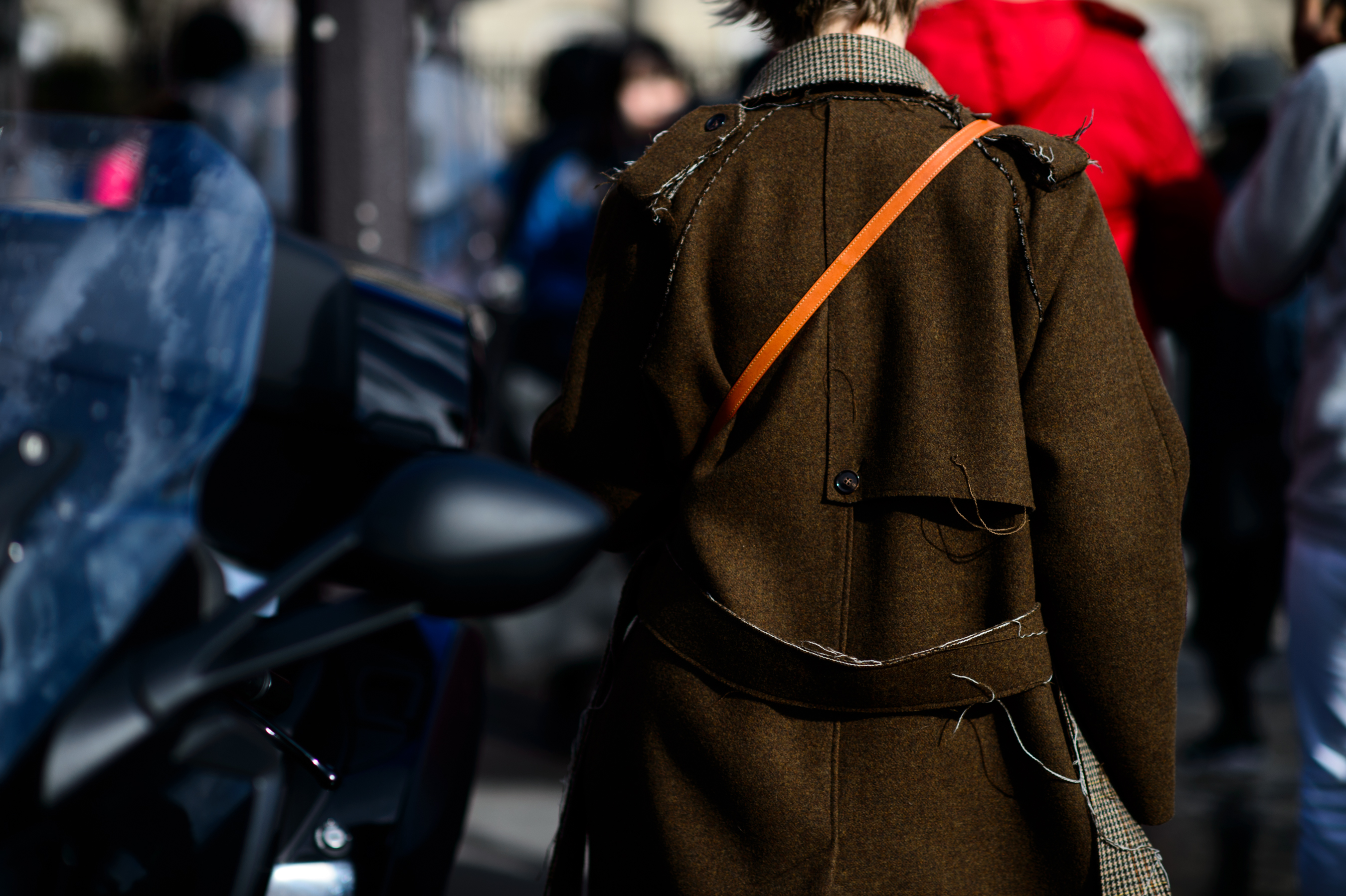 Brown rear detail with orange leather strap