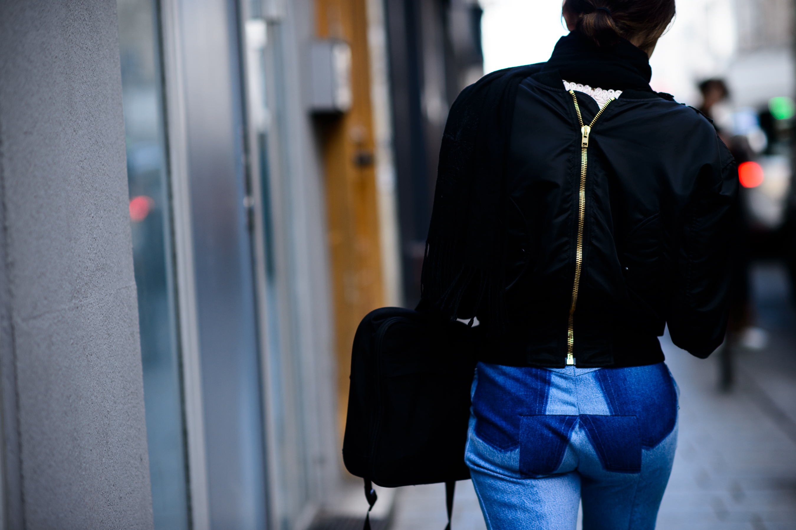 Woman with reverse detail bomber jacket