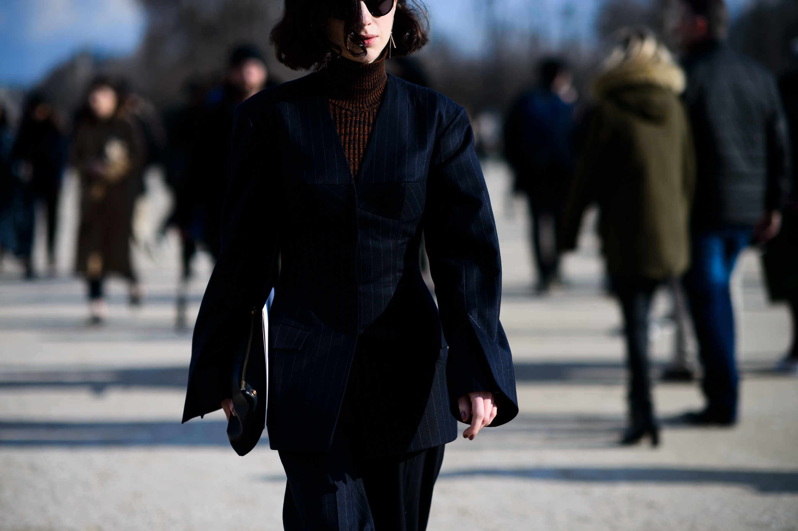 Woman wearing blue pin striped suit