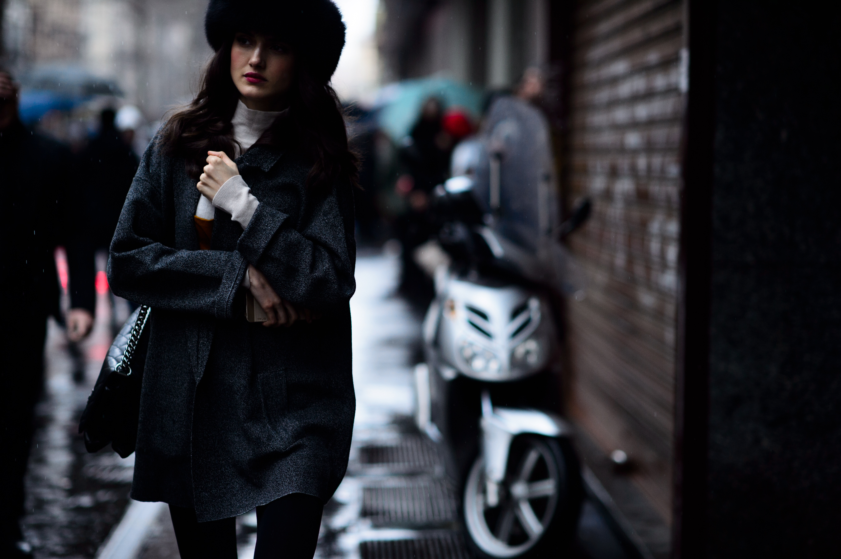 Model wearing fur hat after the show