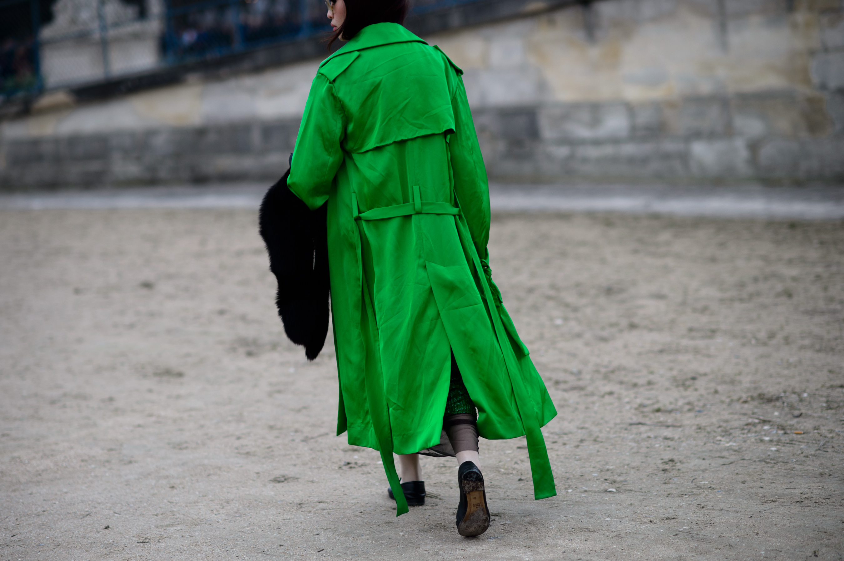 Woman wearing green coat