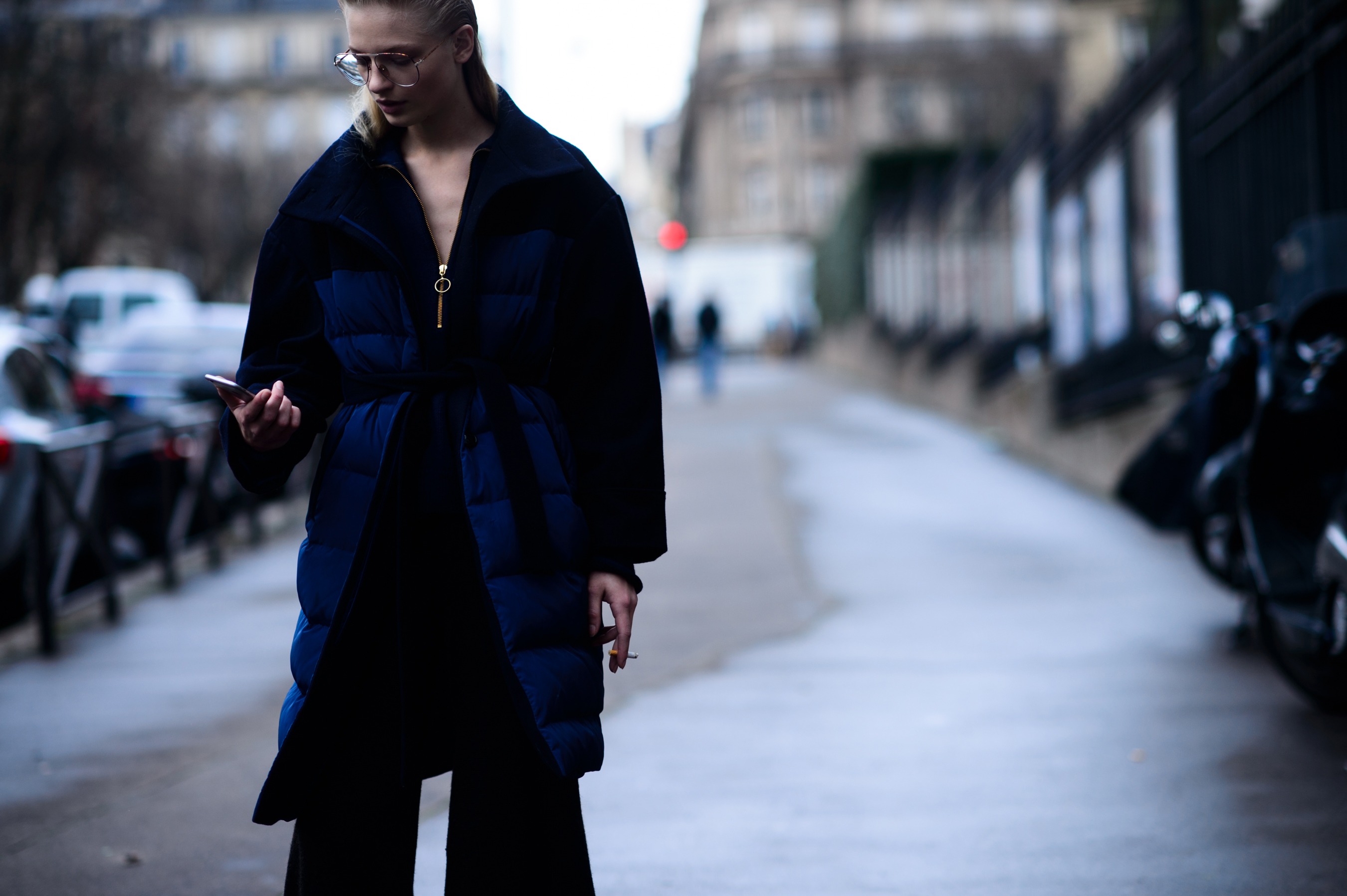 Danish model wearing blue puffer coat