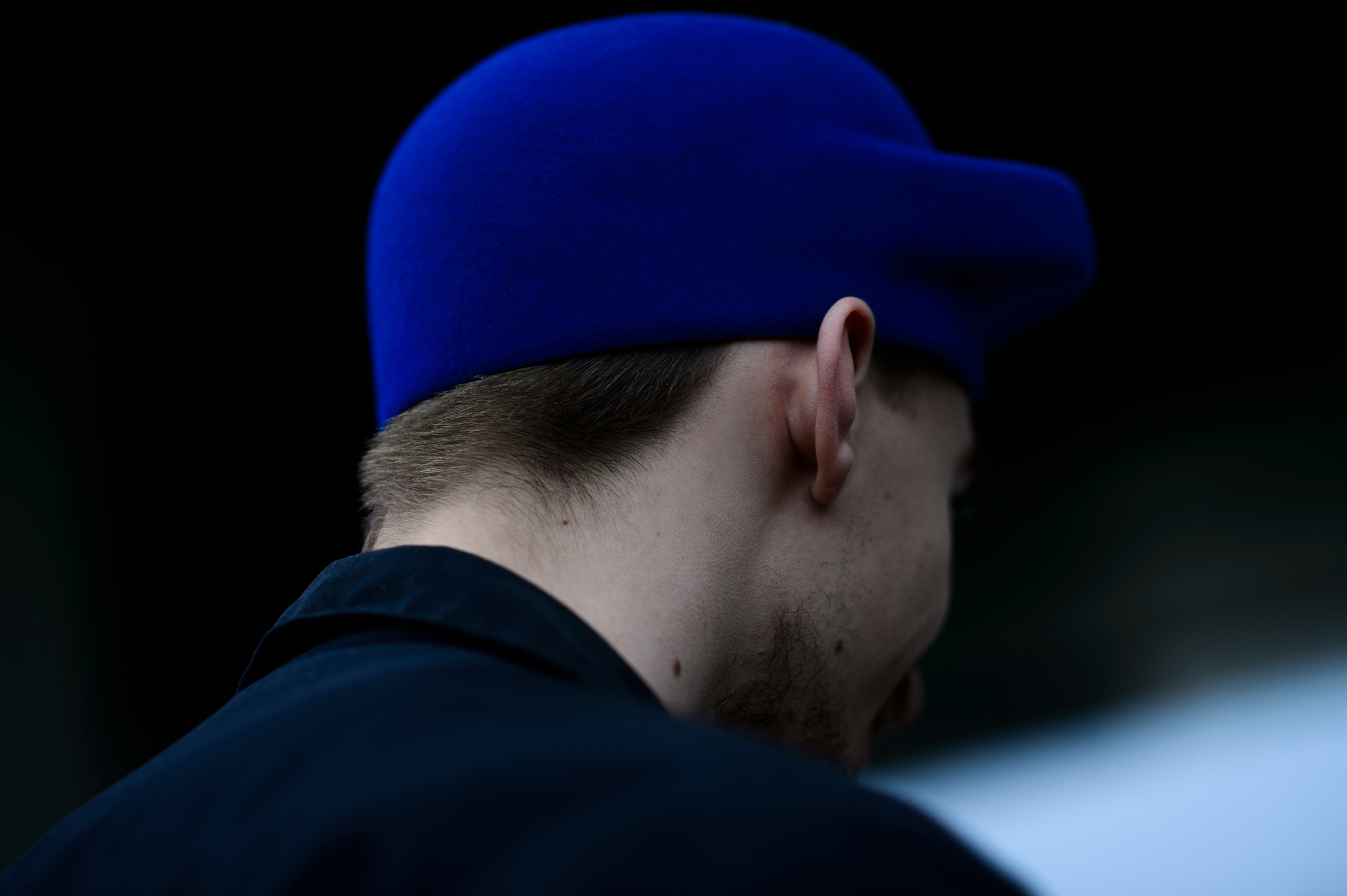 Man wearing weird blue hat