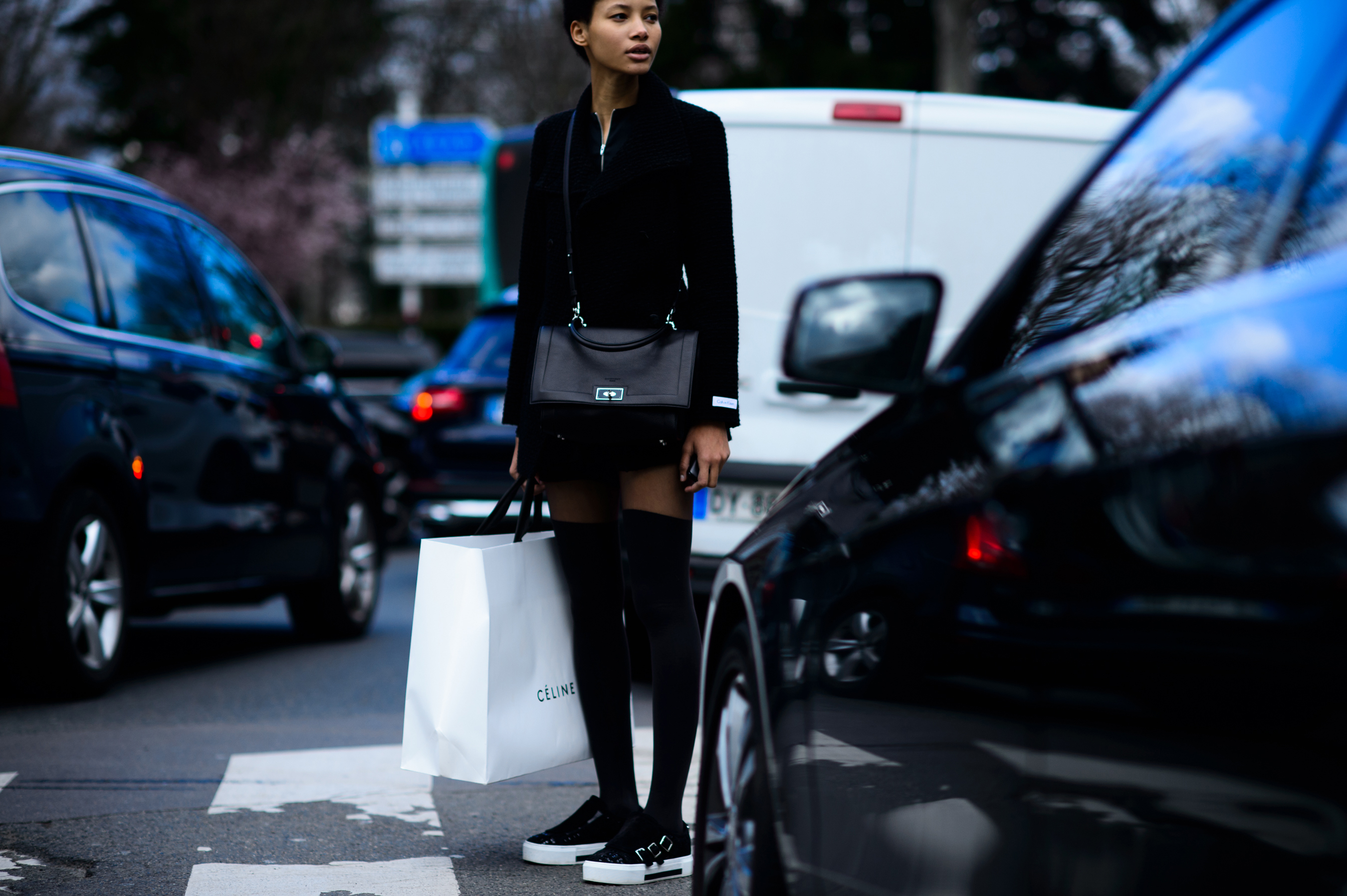 Dominican model wearing thigh-high black socks