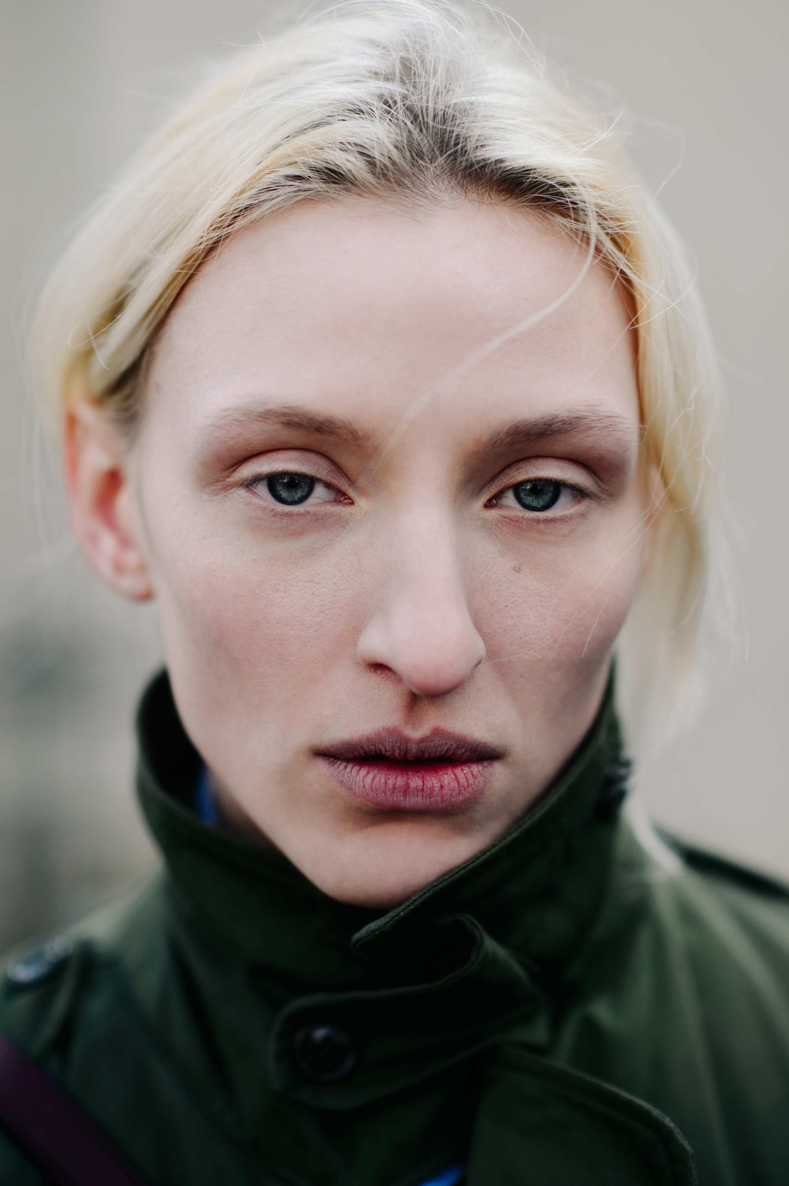 Portrait of American model with blonde hair and blue eyes