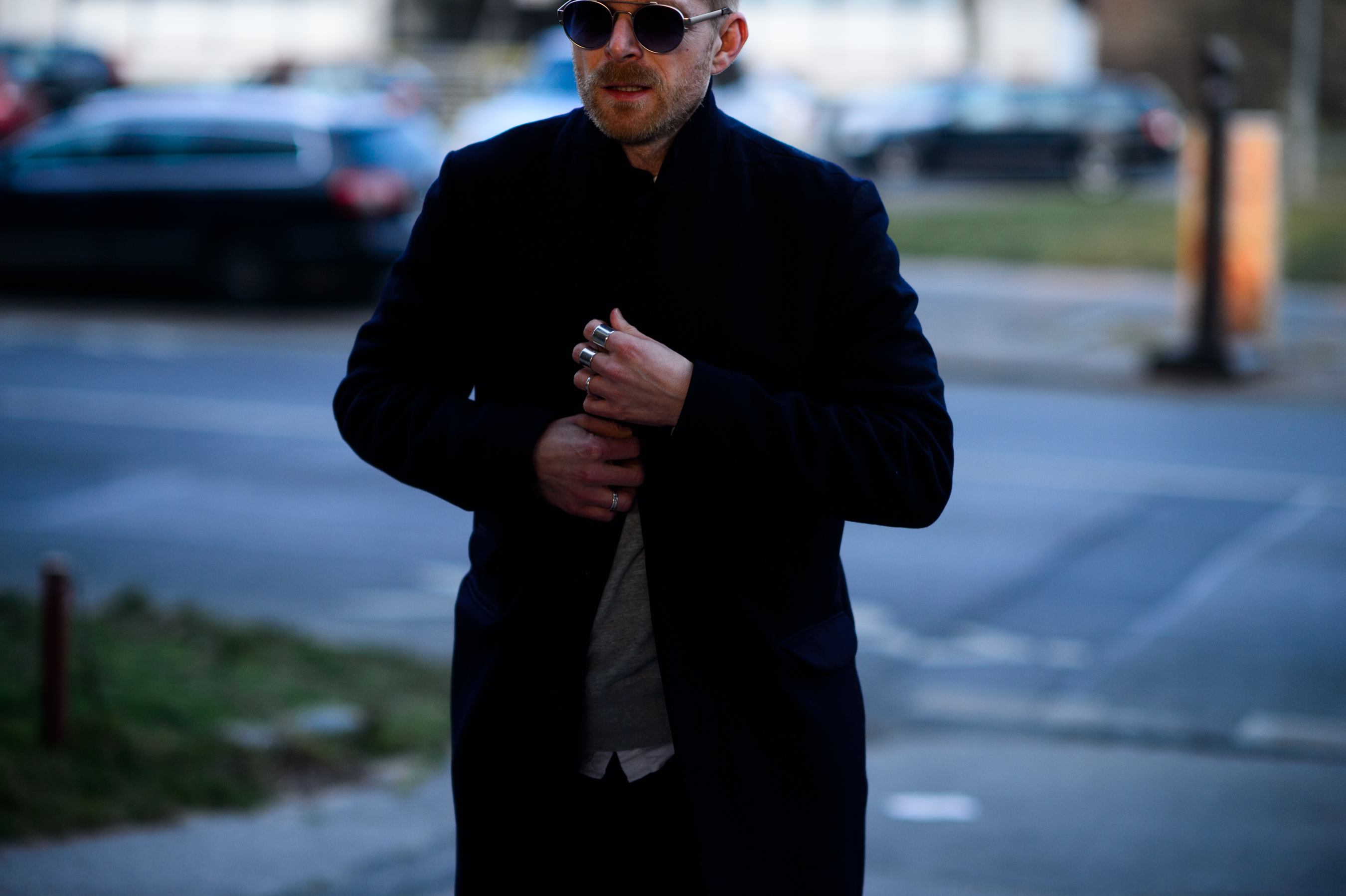 Man wearing glasses before the show