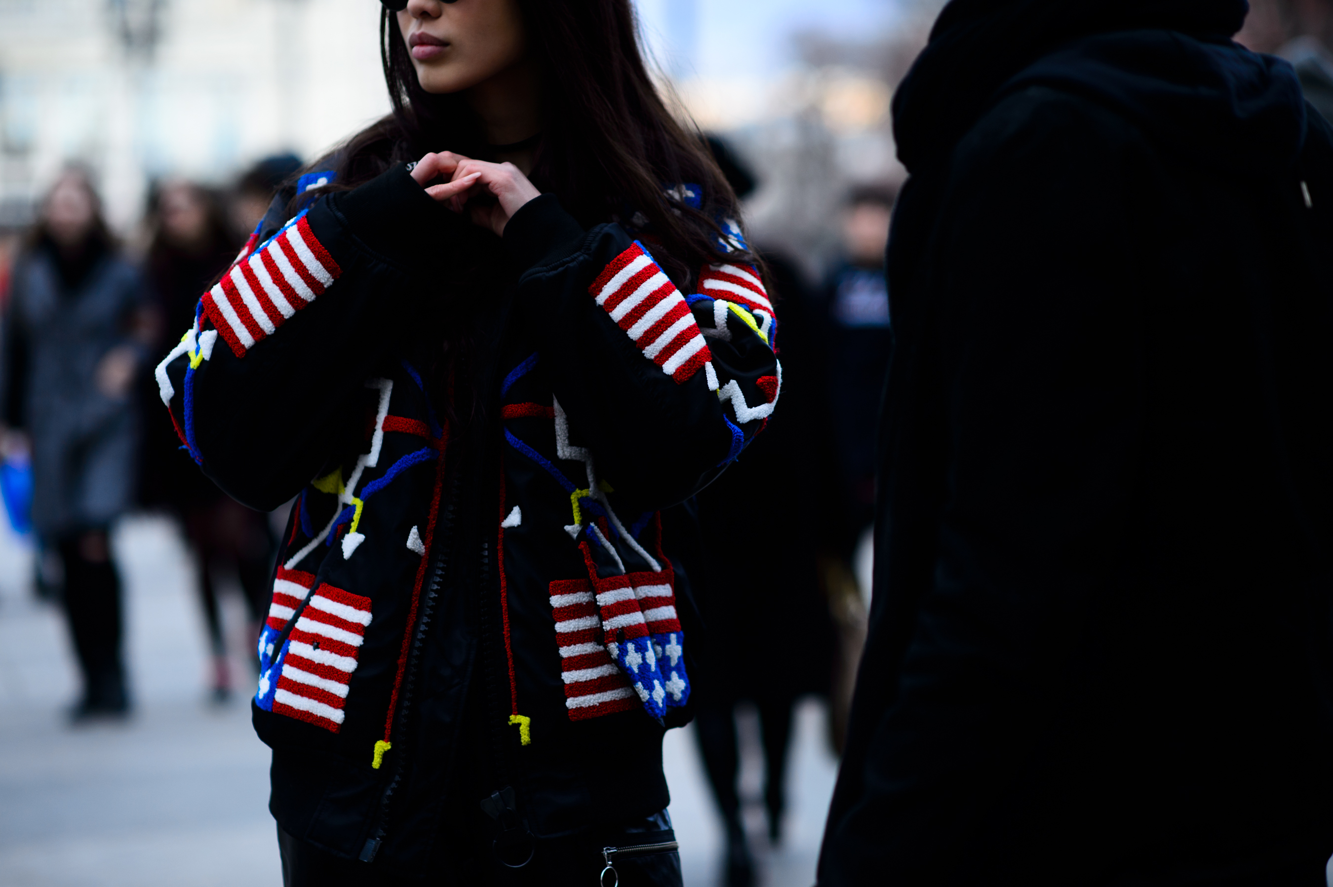 Girl wearing graphic jacket