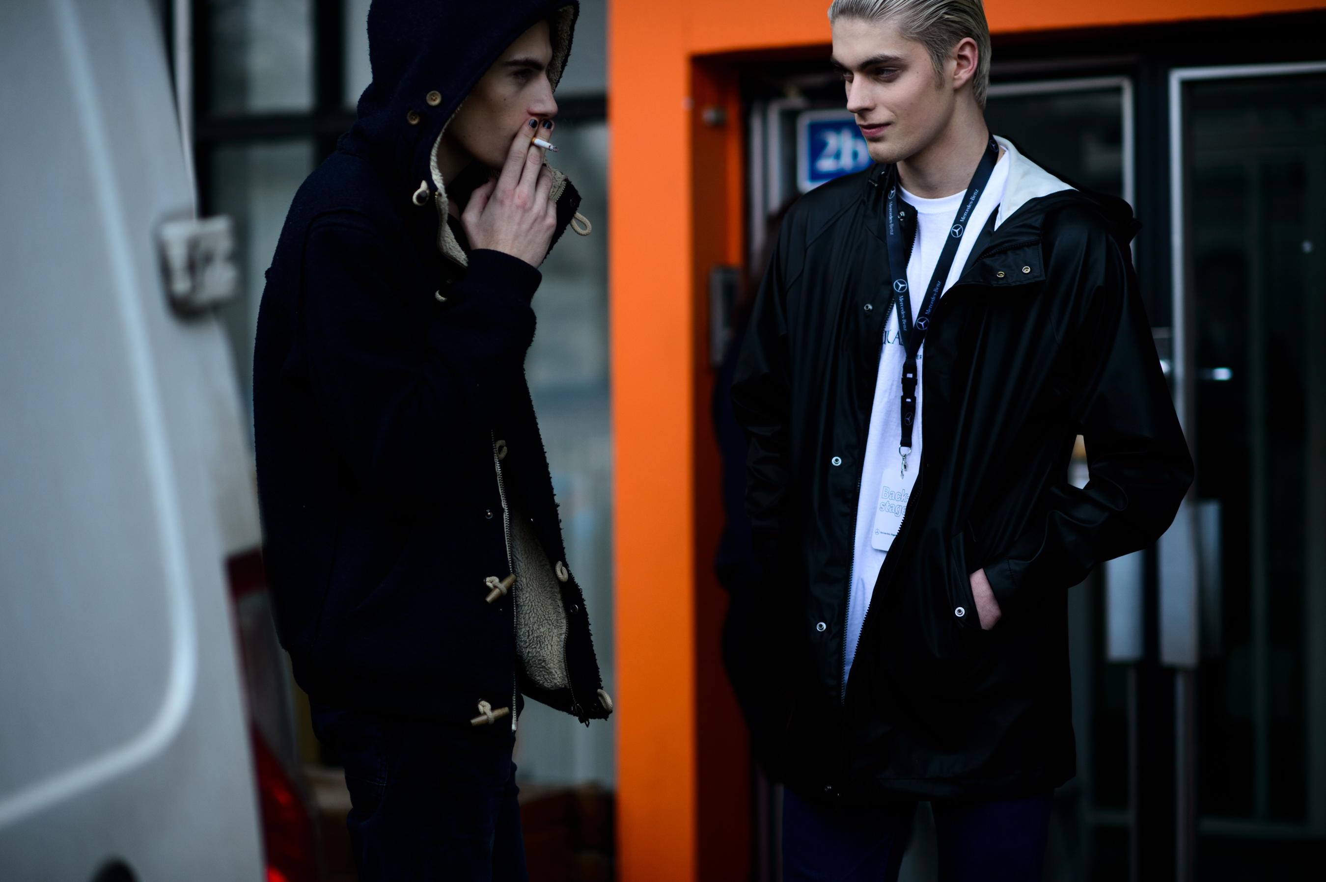 Two male models smoking