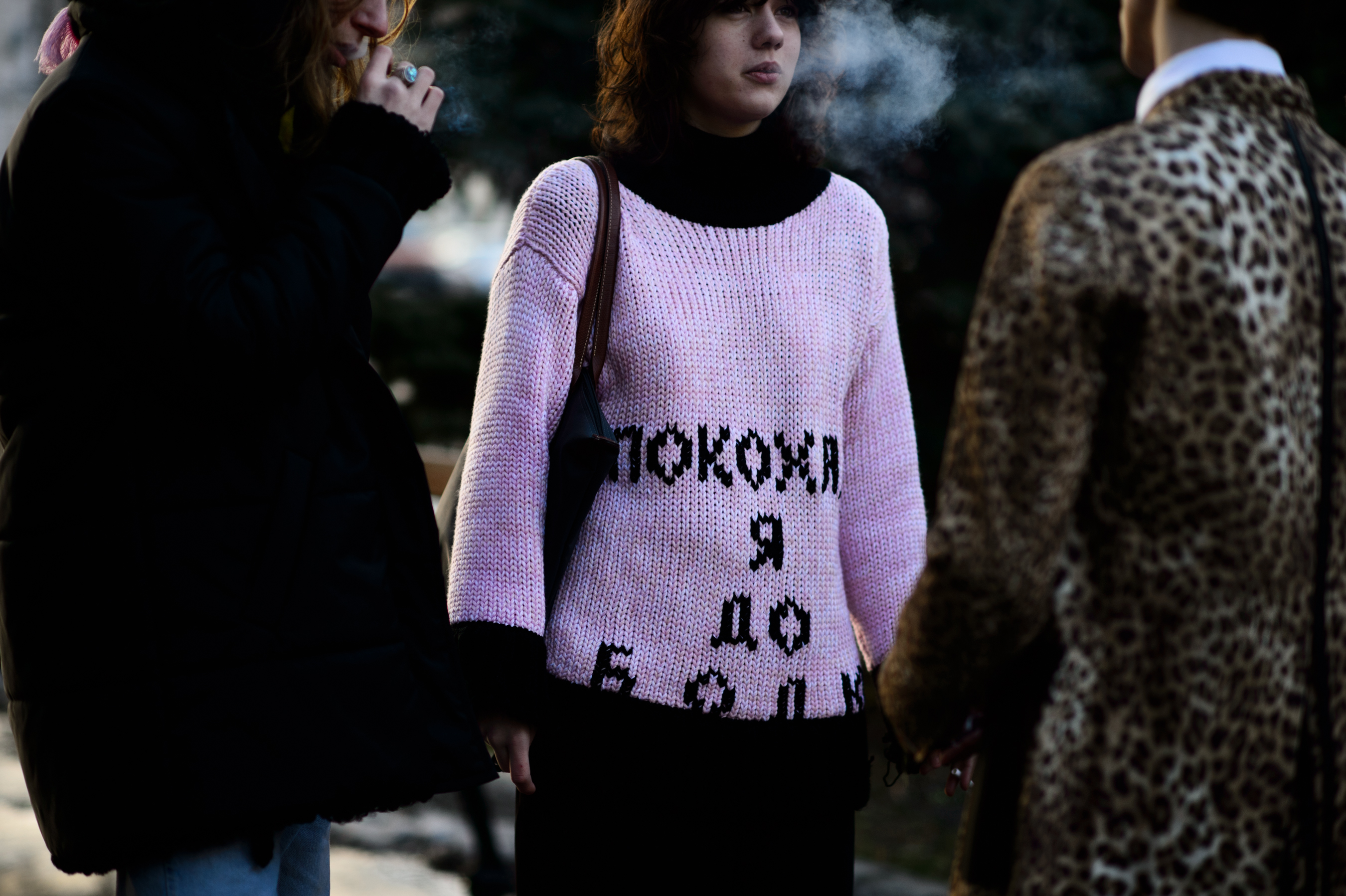 Group of people smoking before show