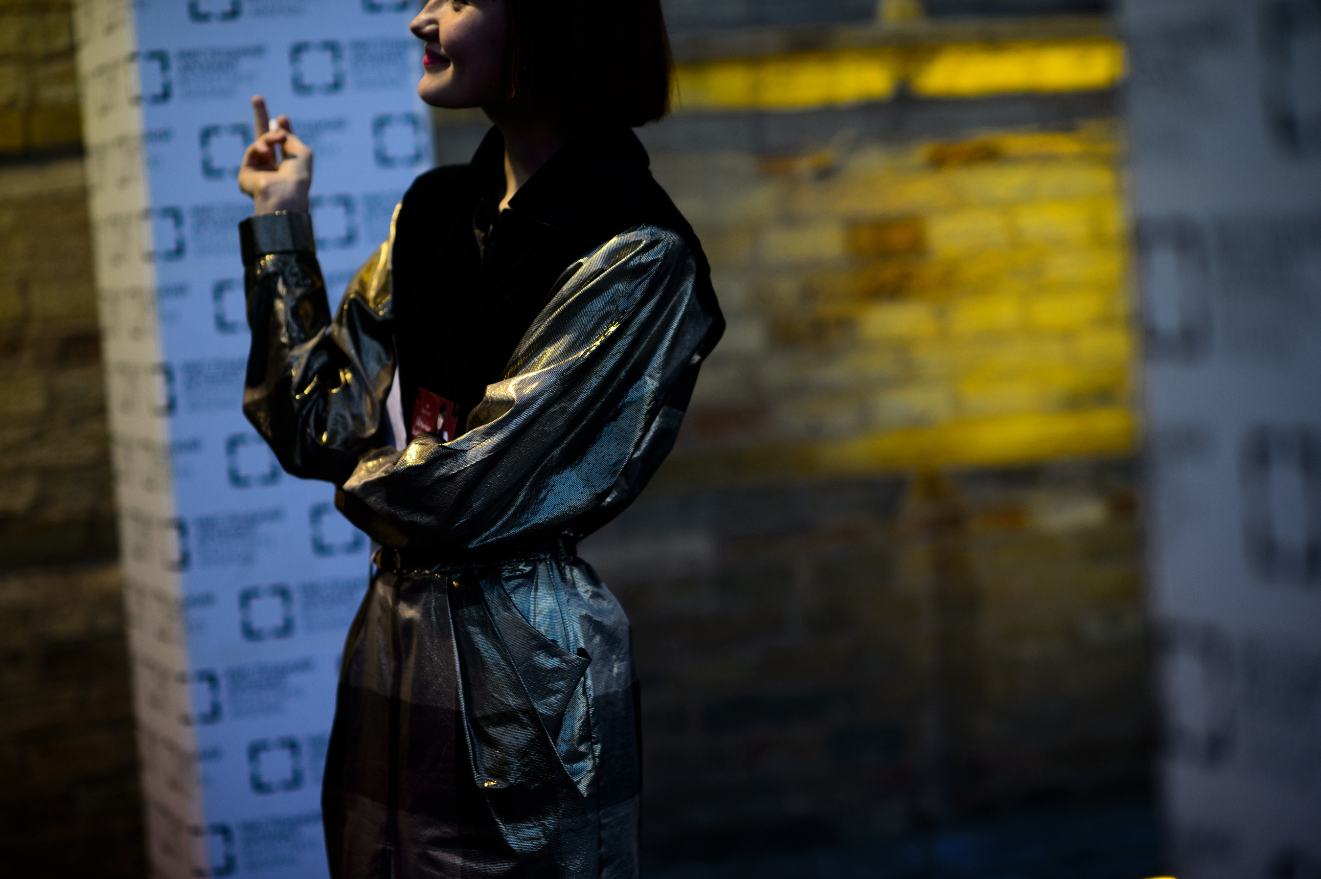 Girl wearing silver jacket