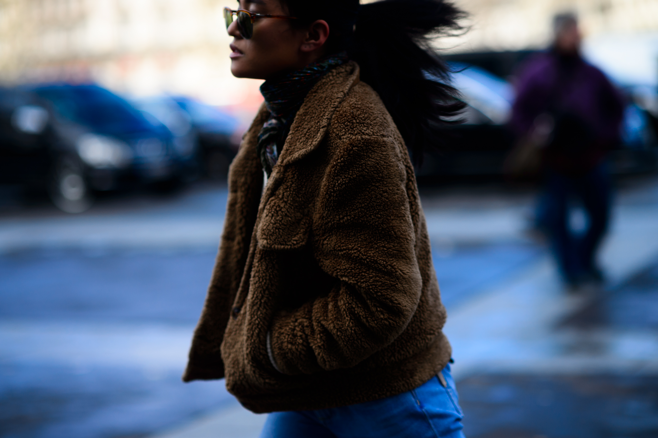Woman running in shearling jacket