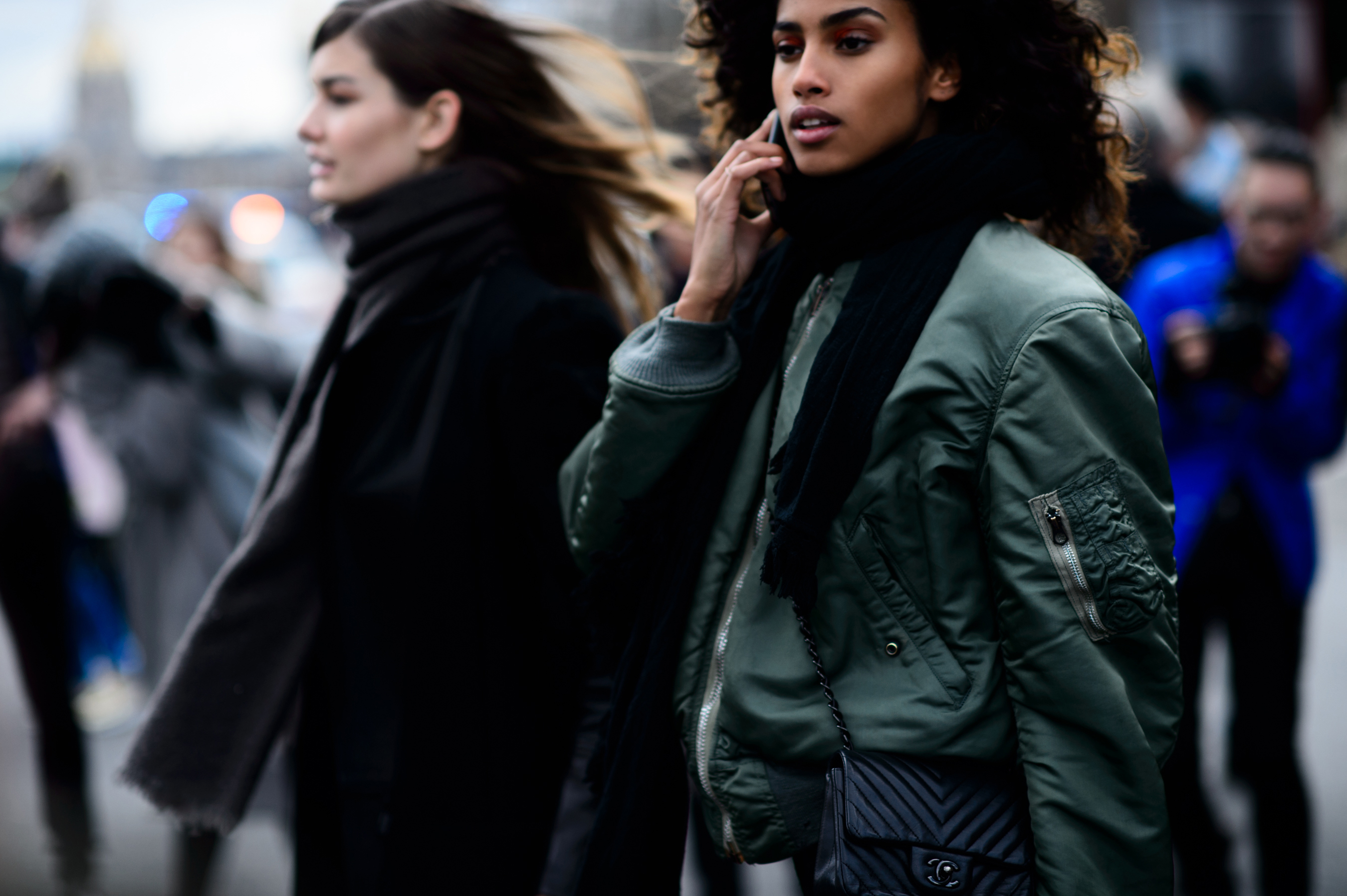 Closeup of two models leaving show