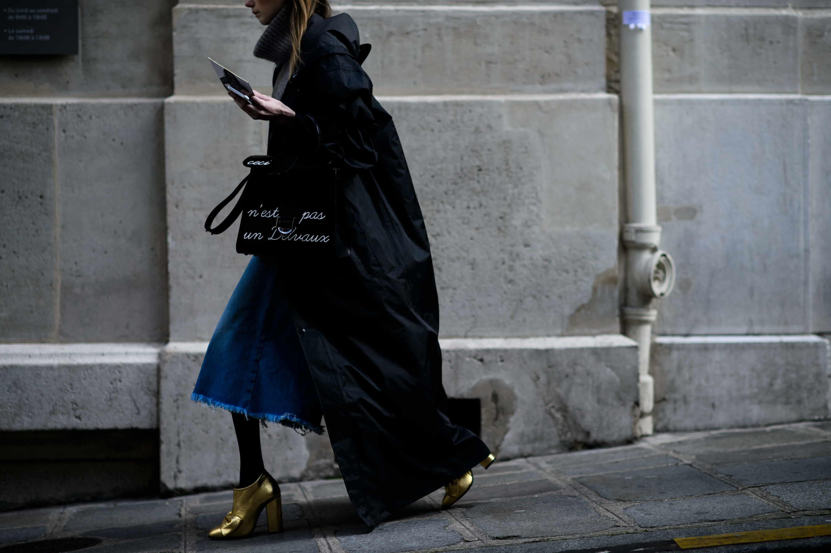 Woman walking in gold heels