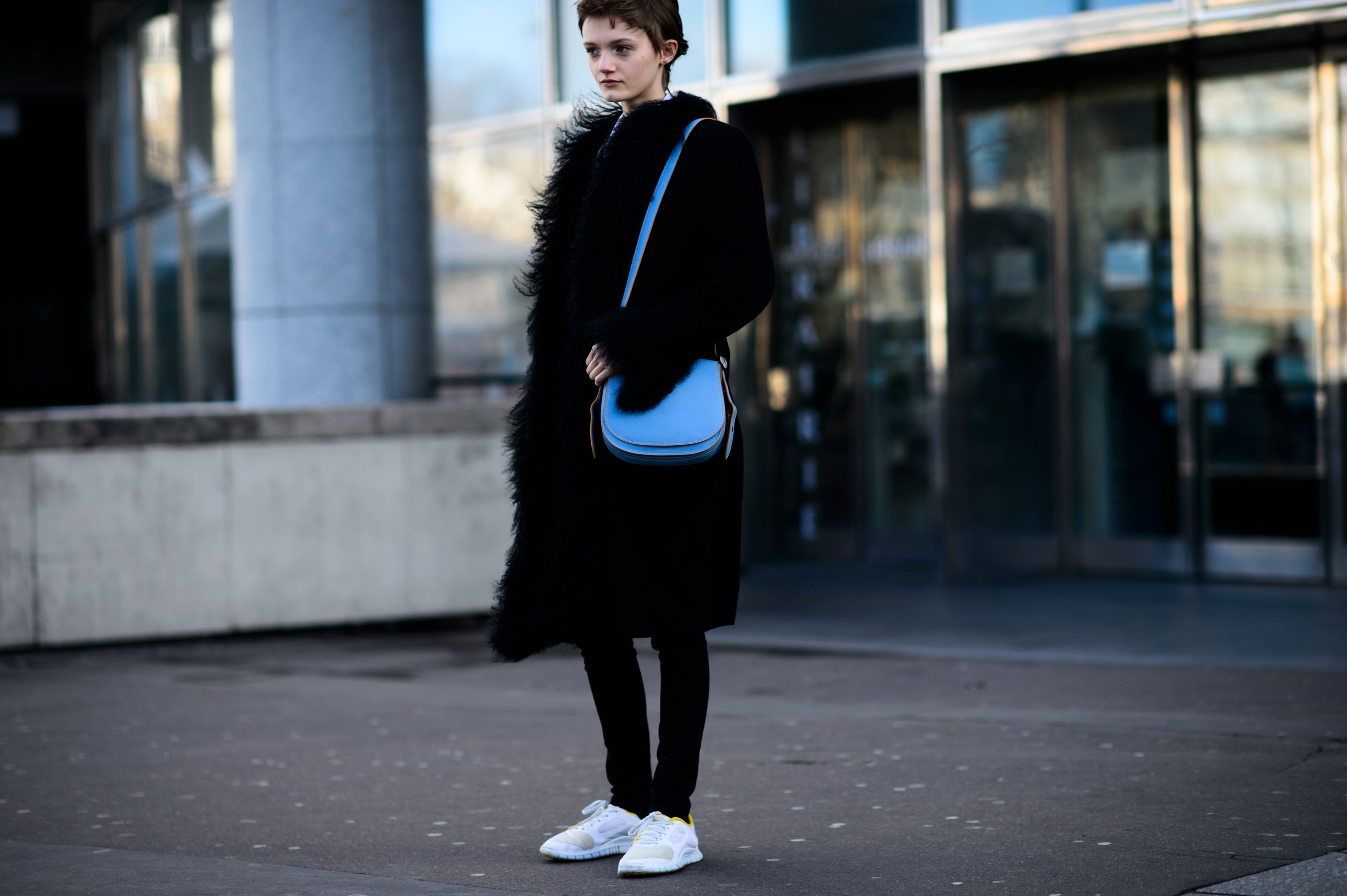 American model wearing fur coat after show