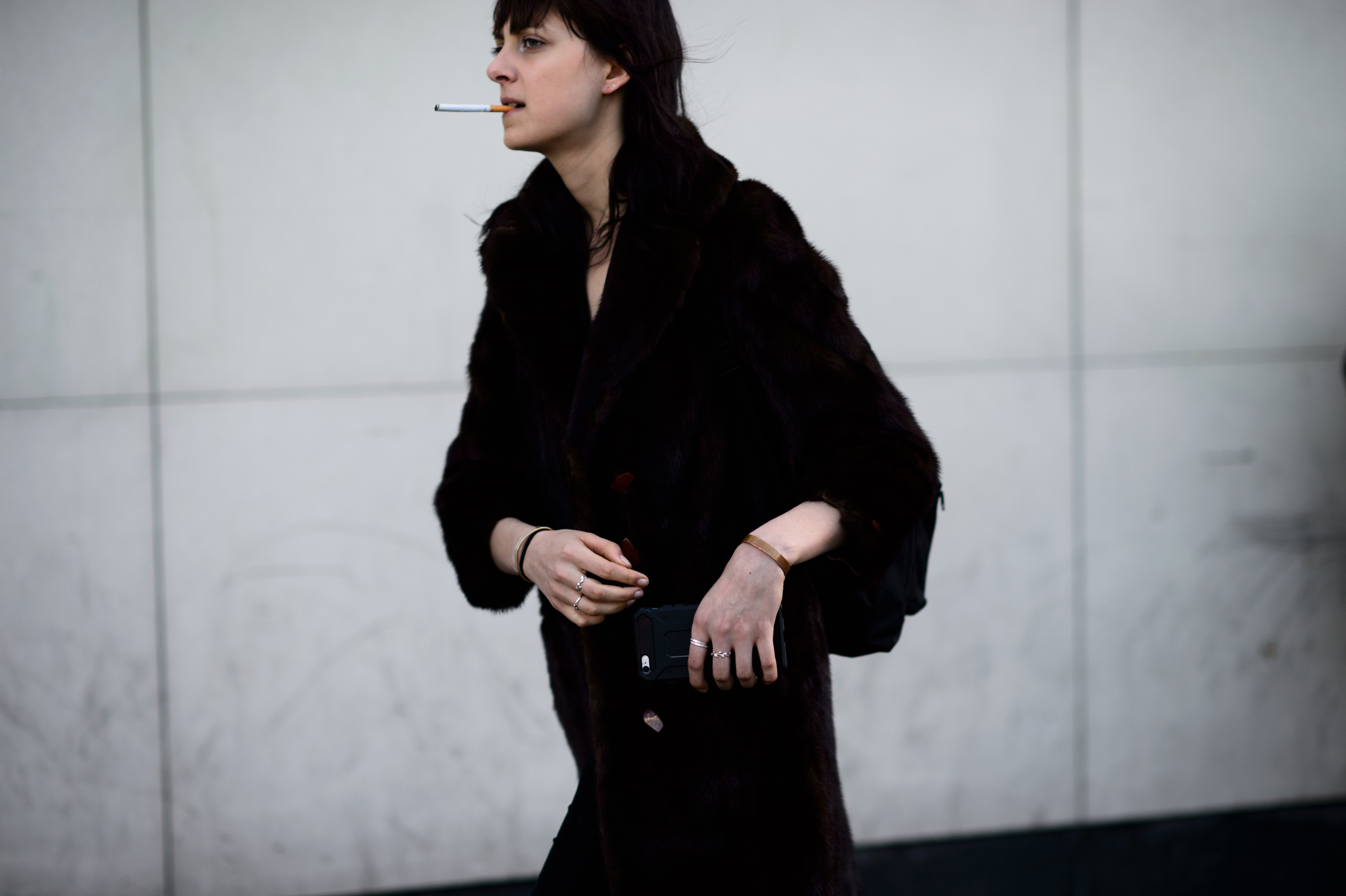 American model smoking after show