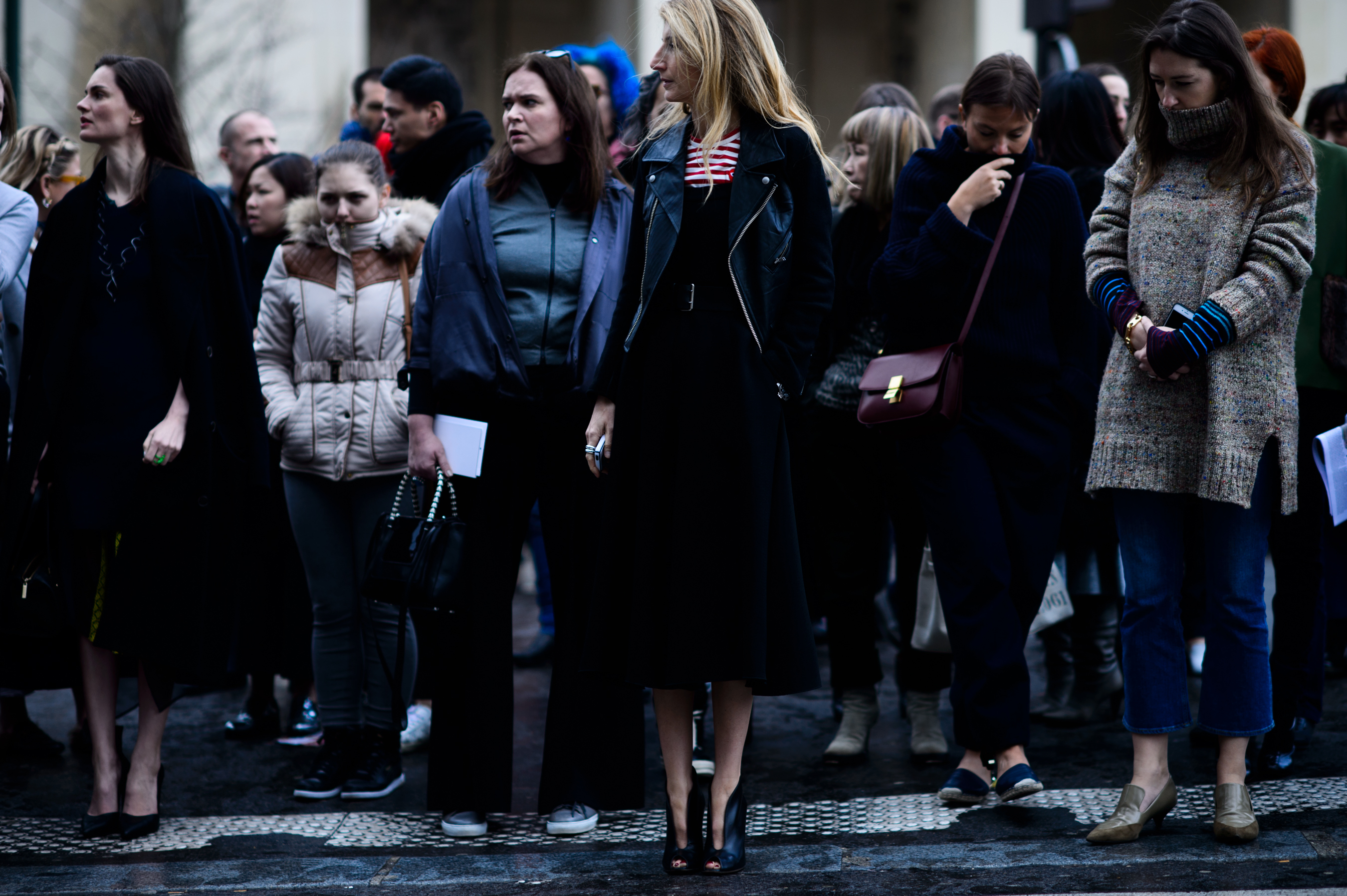 Woman wearing leather biker jacket