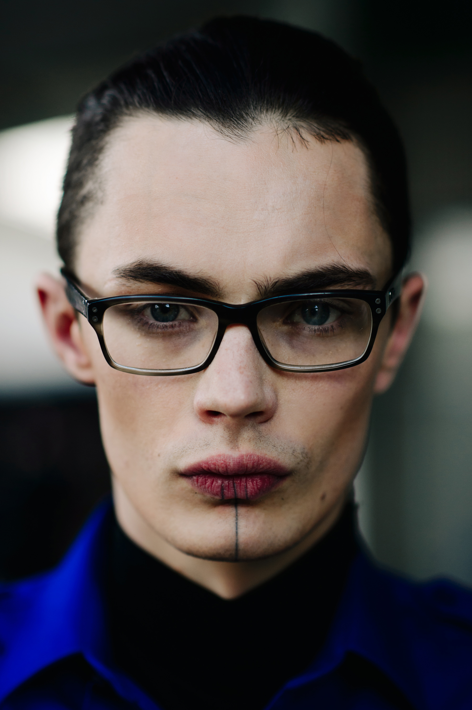 Portrait of a male model wearing glasses