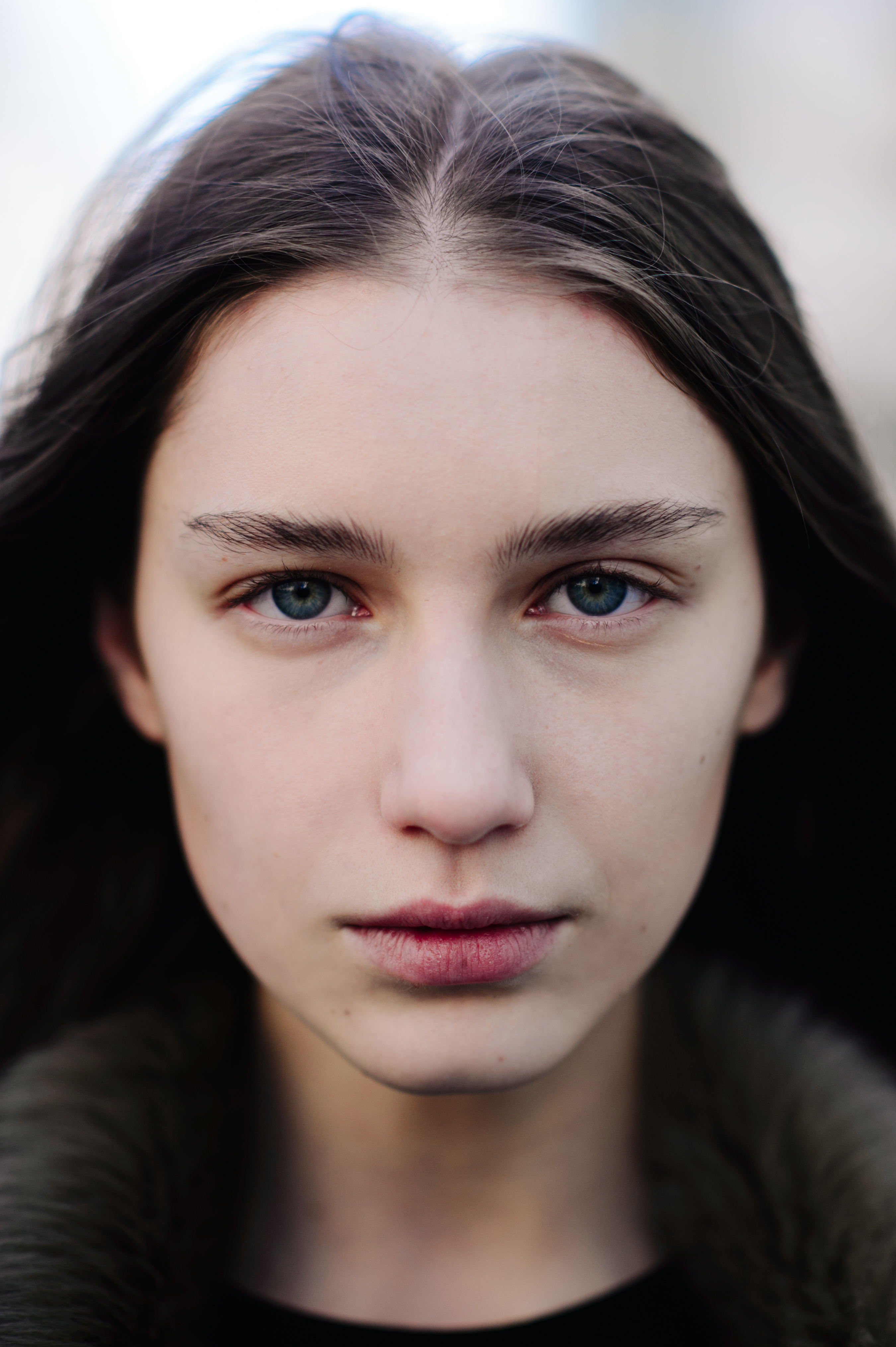 Portrait Russian model with blue and green eyes