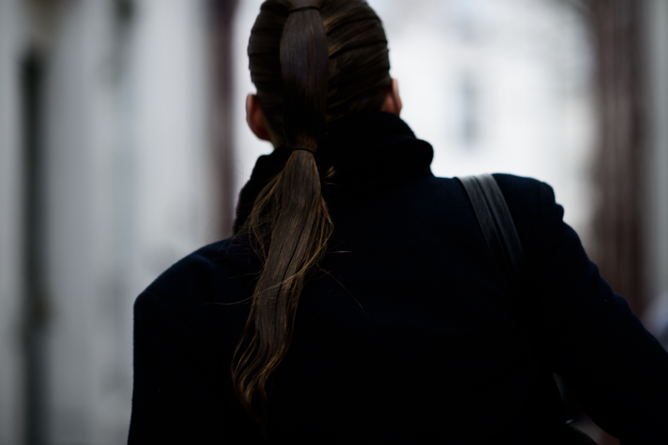 Model with sleek hair after show