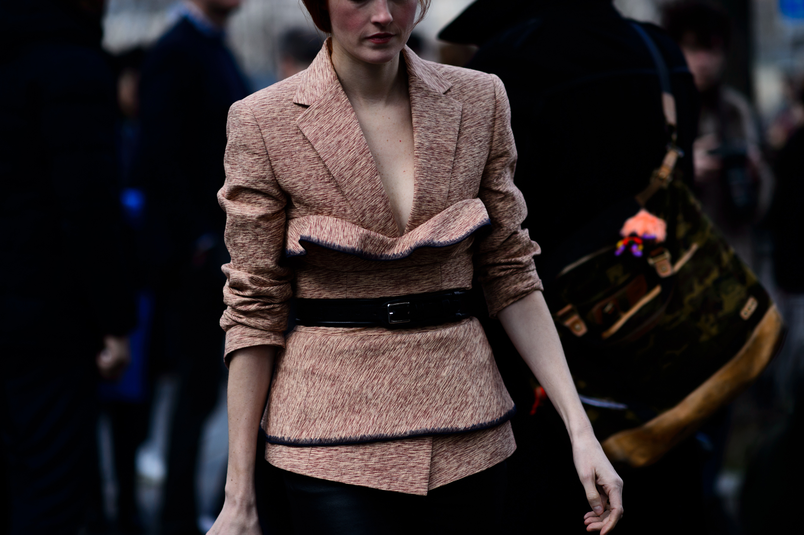 Closeup of woman in patterned blazer blouse