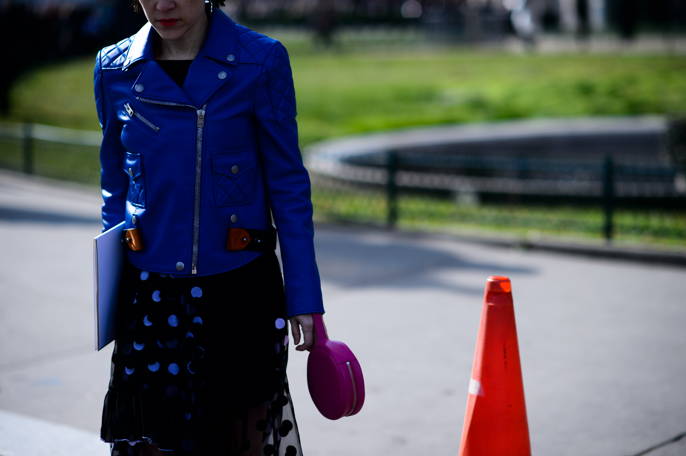Woman wearing blue leather jacket