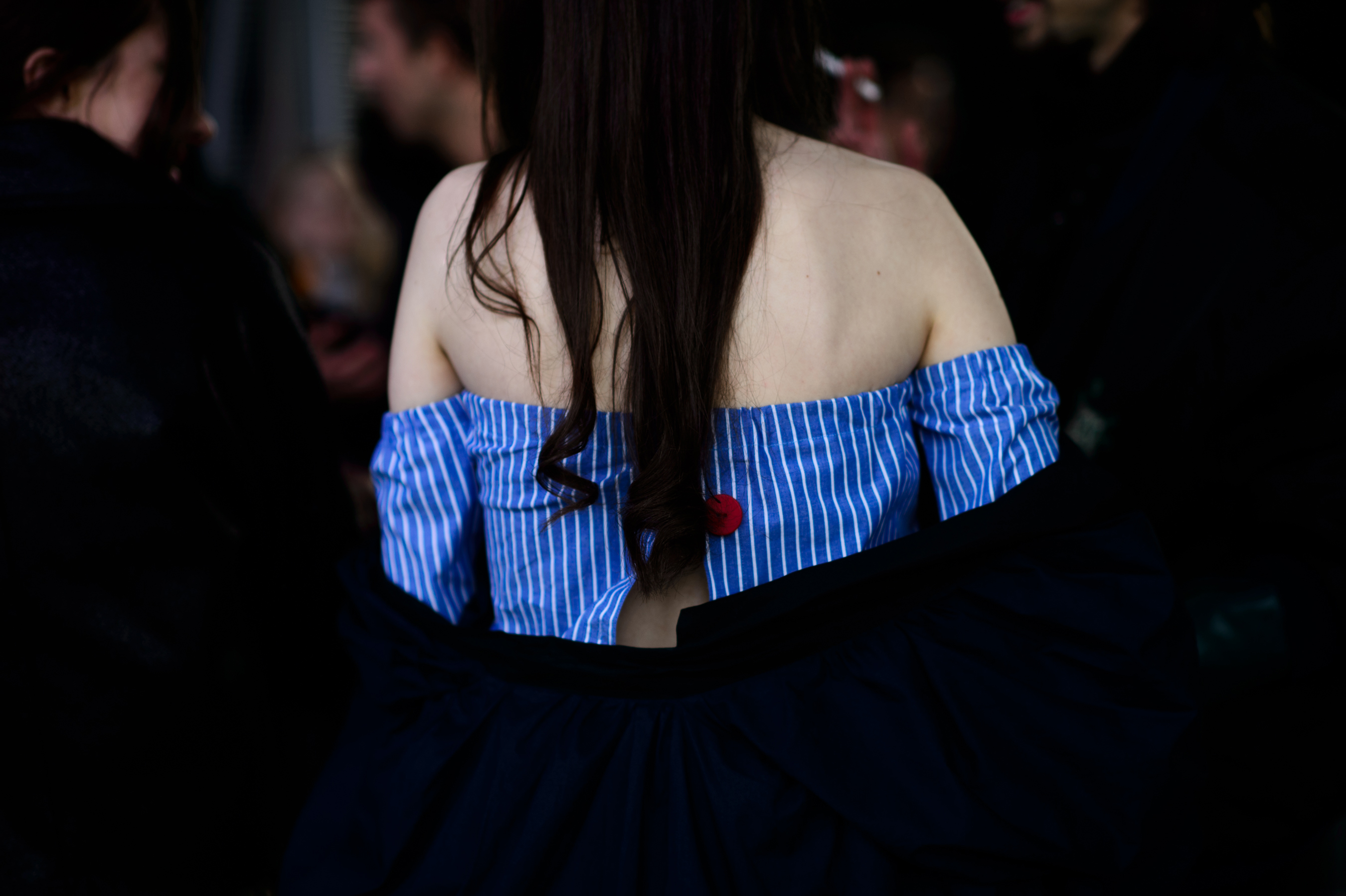 Woman wearing open back dress